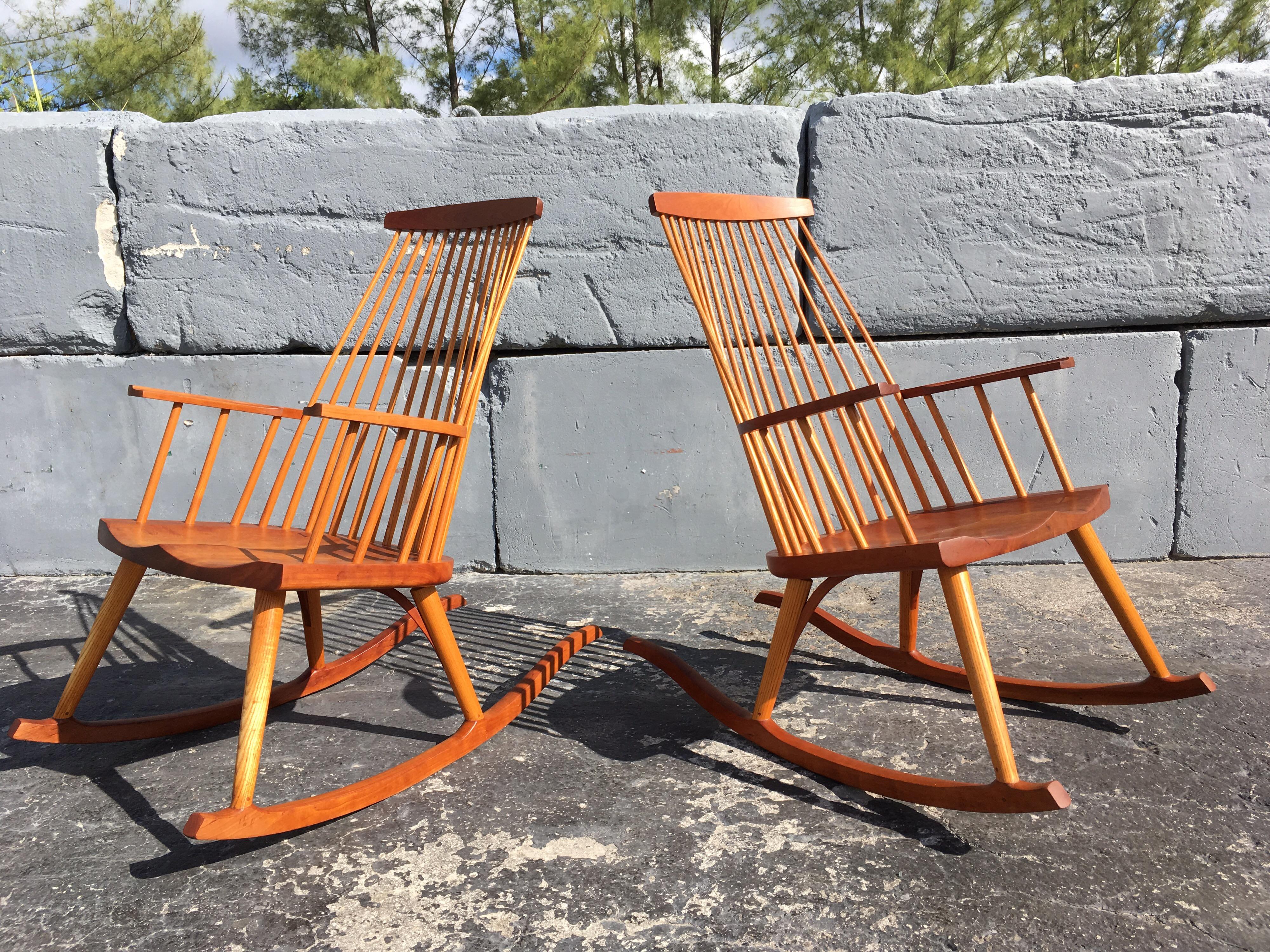 Beautiful pair of Thomas Moser rocking chairs. Cherry and oakwood. Signed.