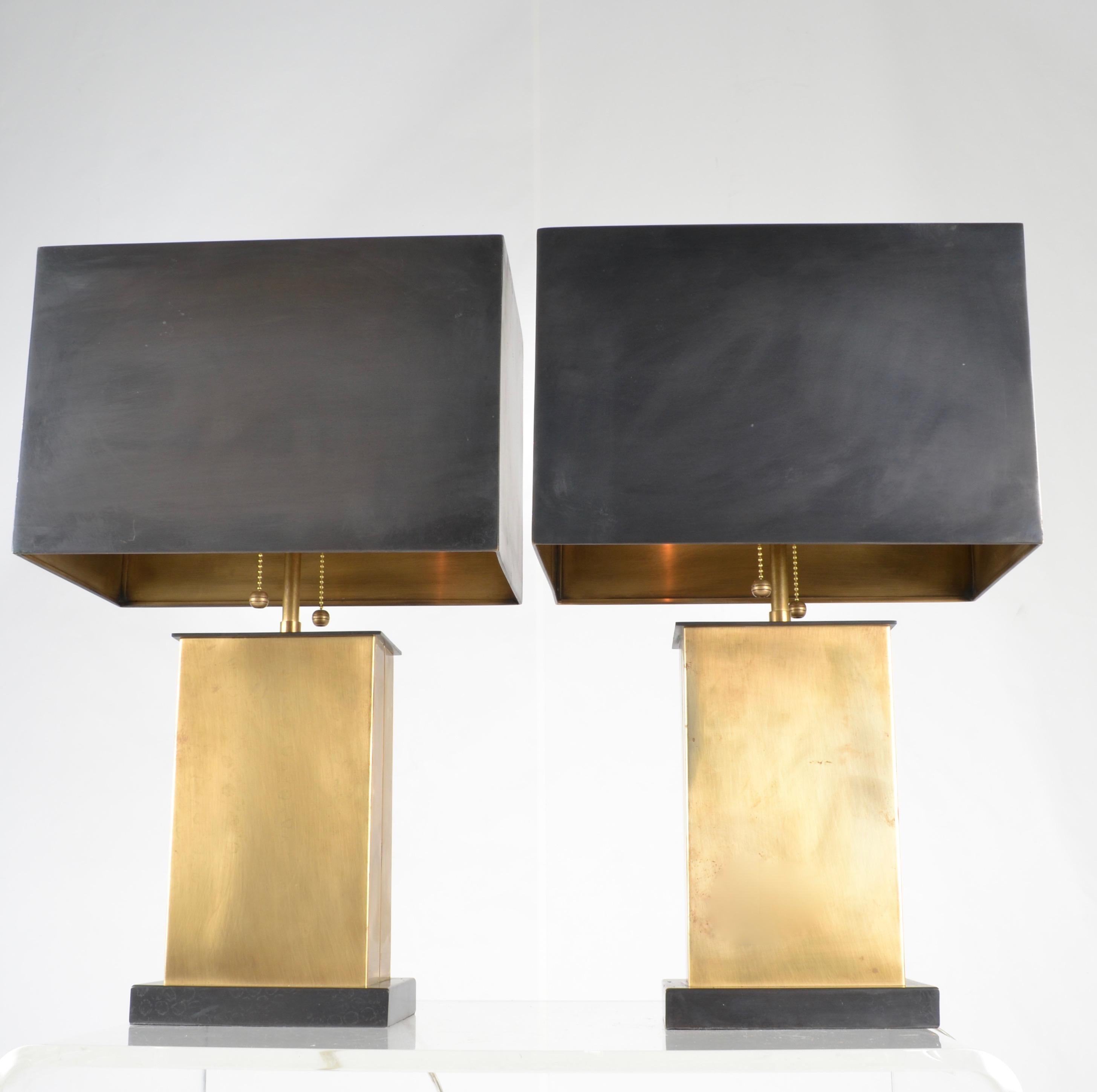Wonderful hand rubbed antique brass finish on this pair of visual comfort lamps, with bronze shades. Very gently used, no significant wear.