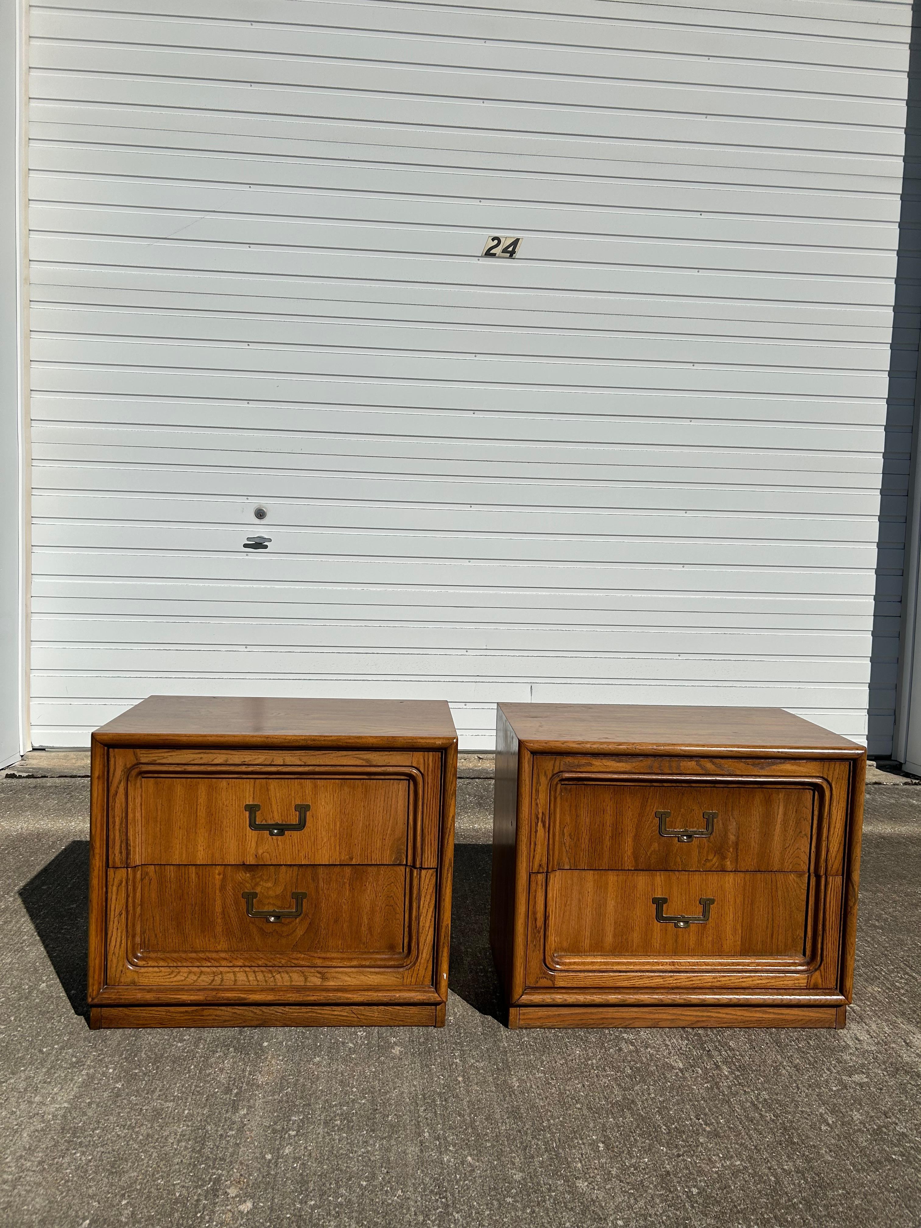 Pair of Thomasville End tables or nightstands. It is hard finding a pair of end tables that aren't from a big box store!! Claim these for your bedroom or guest bedroom. The nightstands have beautiful brass handles for 2 drawers on each. The oak wood