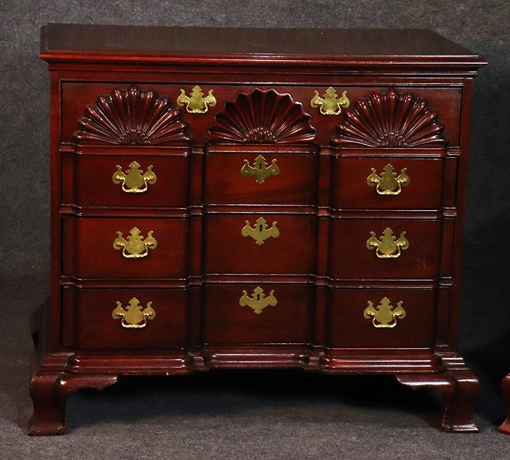 Pair of Thomasville solid mahogany 4-drawer block front commodes.