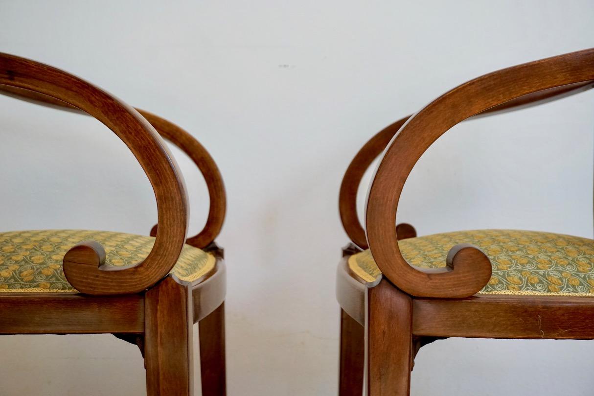 Pair of restored Thonet armchairs in style of Otto Prutscher, with Backhausen upholstery

These beautifully shaped Art Nouveau armchairs were made in the iconic Wiener Werkstatte (Viennese Workshop) founded by Josef Hoffmann and Koloman Moser.