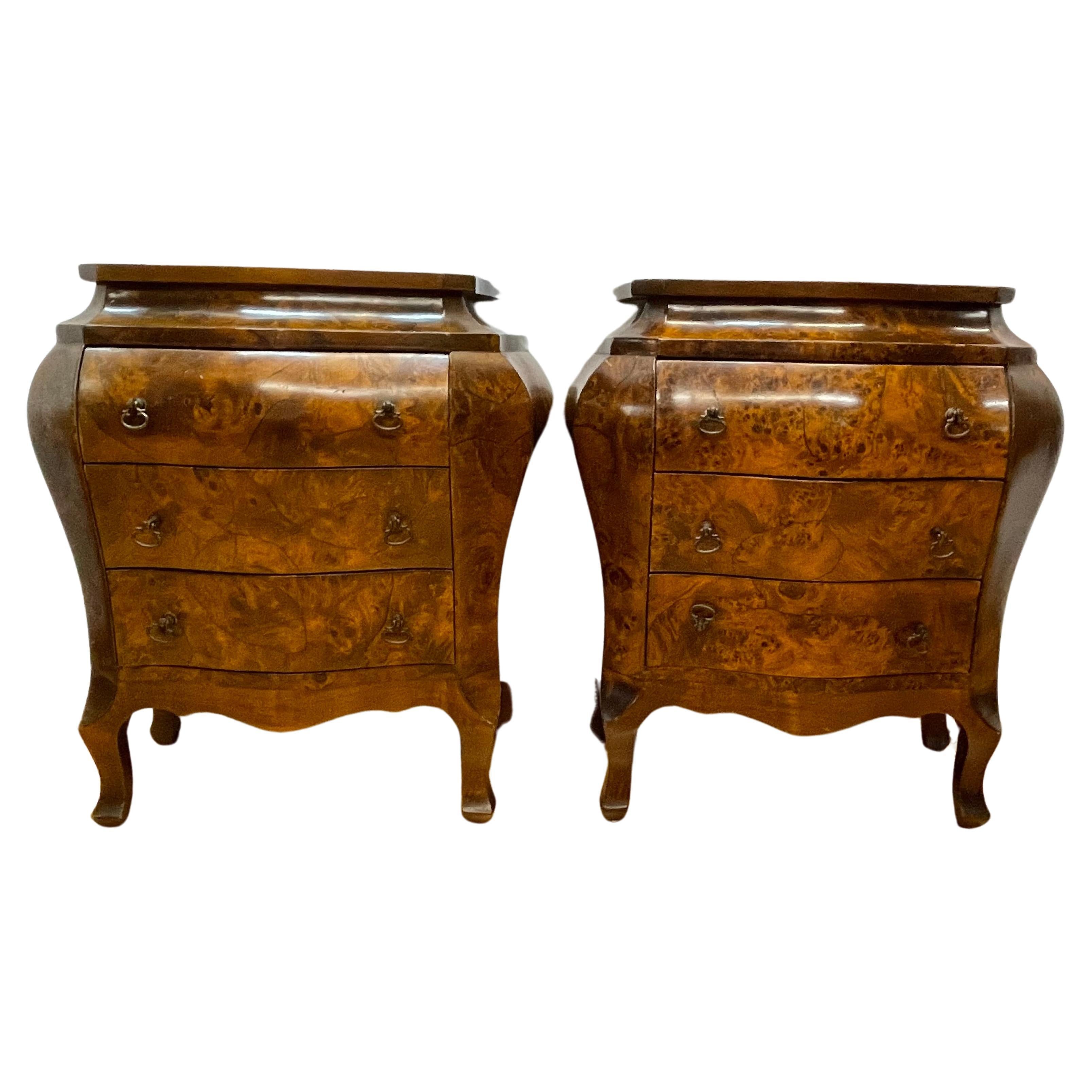Pair of three draw bombe commodes marked Italy with a maple burled veneer For Sale