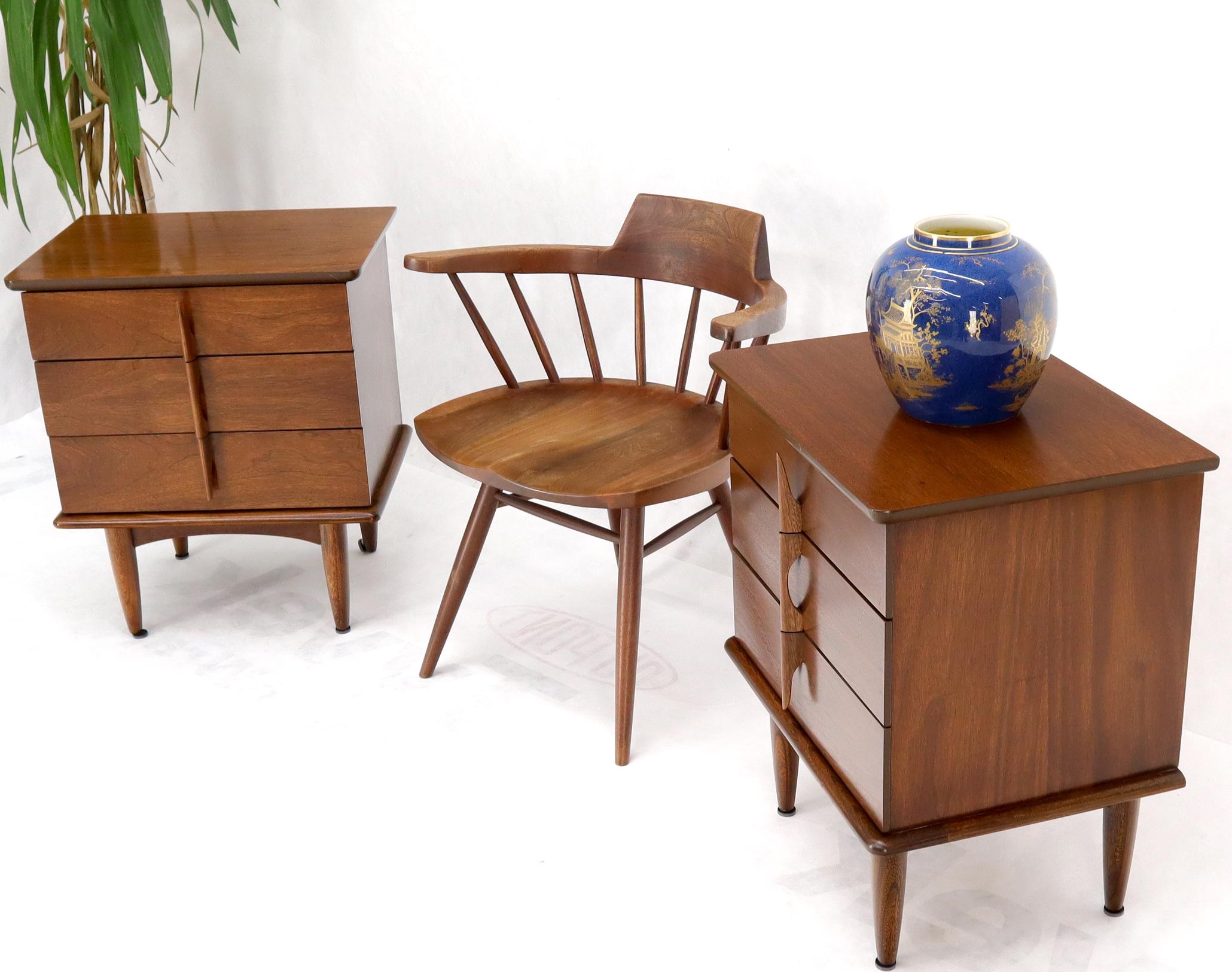 Pair of walnut Mid-Century Modern three drawer nightstands or end tables. Sculptural walnut pulls.