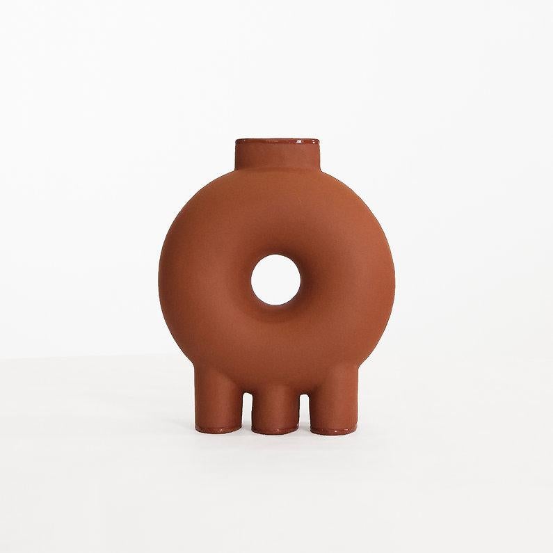 Three leg ceramic vase by Faina
Design: Victoriya Yakusha
Materials: Ceramic.
Dimensions: L 31 x W 14 x H 39 cm

In search of new-old design messages, Victoria Yakusha conducted a study of the daily traditions of our ancestors. The times of