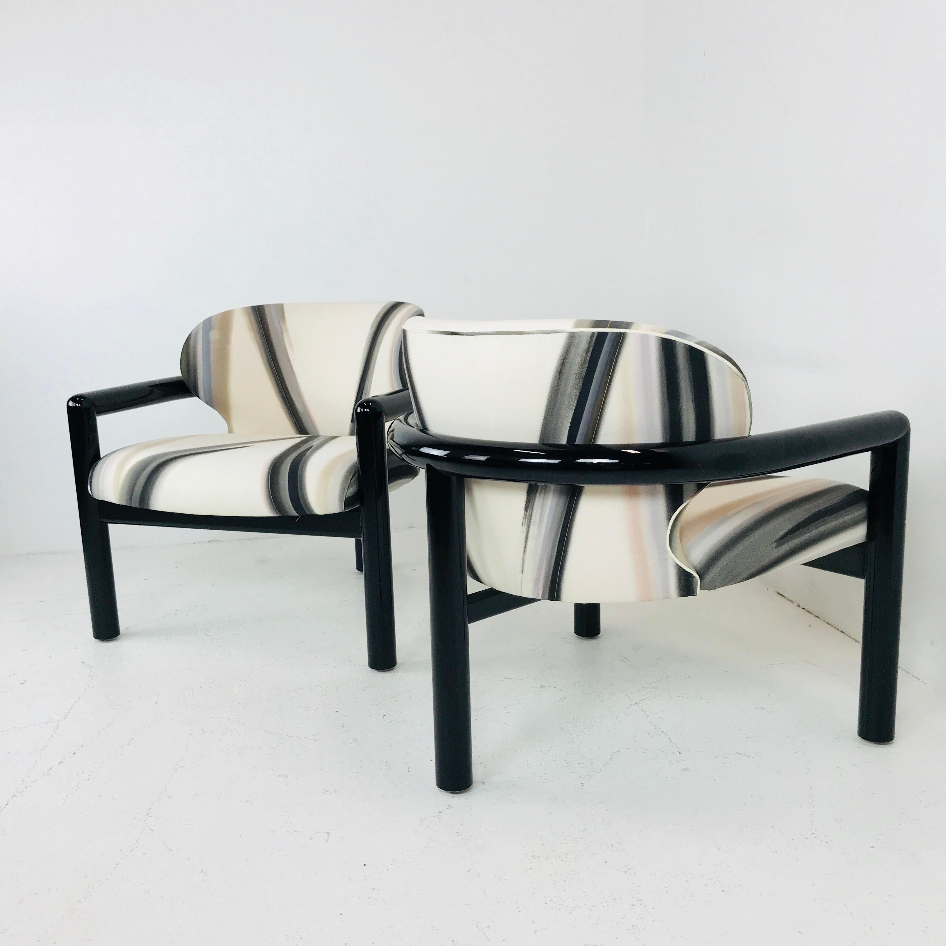 Pair of Three-Legged Lounge Chairs 1