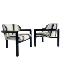 Pair of Three-Legged Lounge Chairs