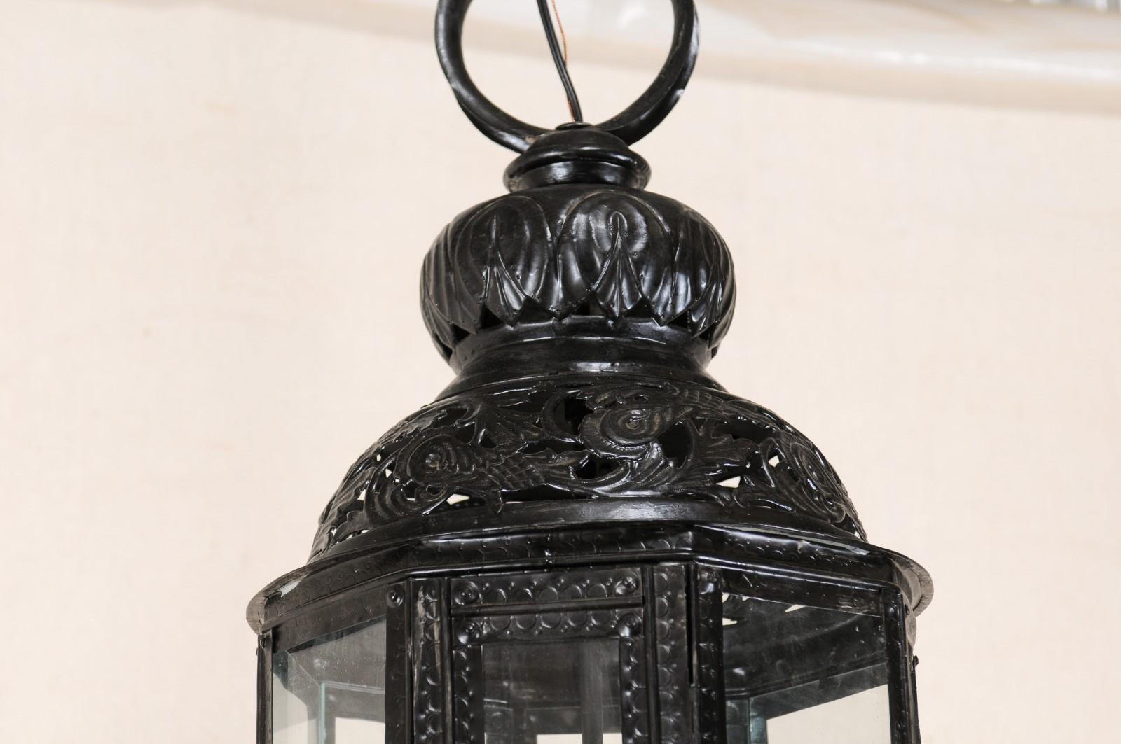 Metal Pair of Three-Light Moroccan-Inspired European Lanterns in Black Color w/Glass For Sale
