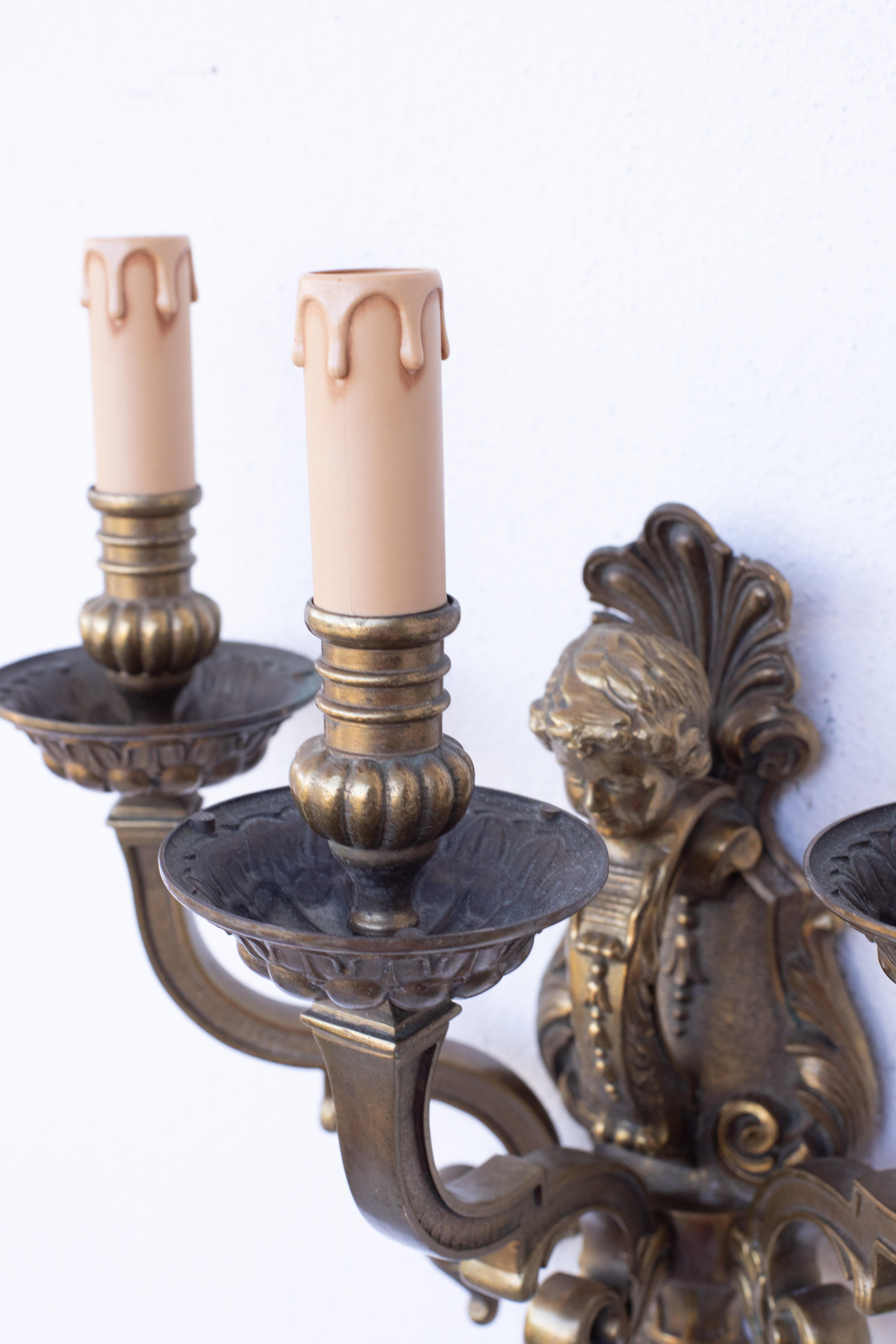 Early 20th Century Pair of three-light sconces in the Louis XVI style For Sale