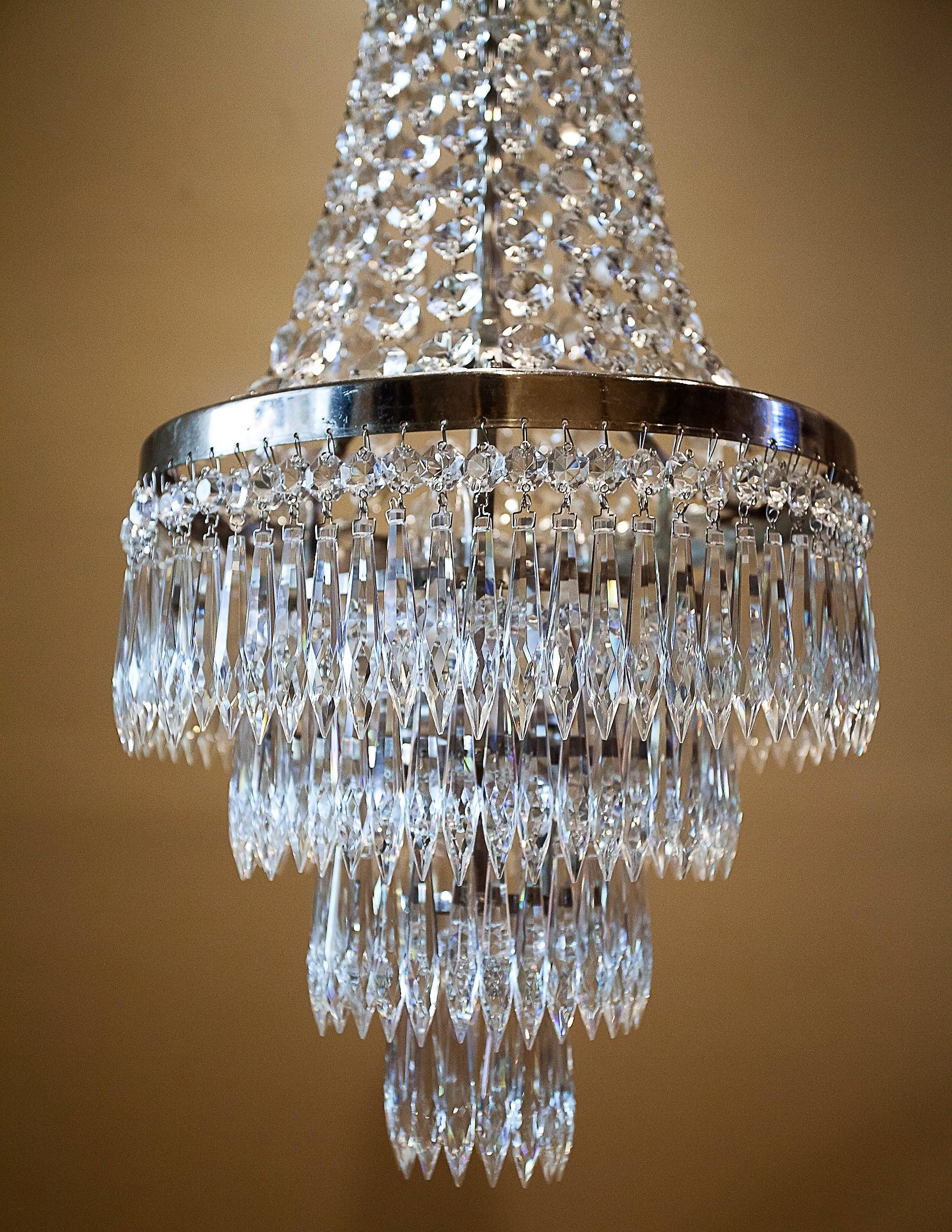 Mid-20th Century Pair of Three-Light Tent-and-Cascade Chandeliers, circa 1935 For Sale