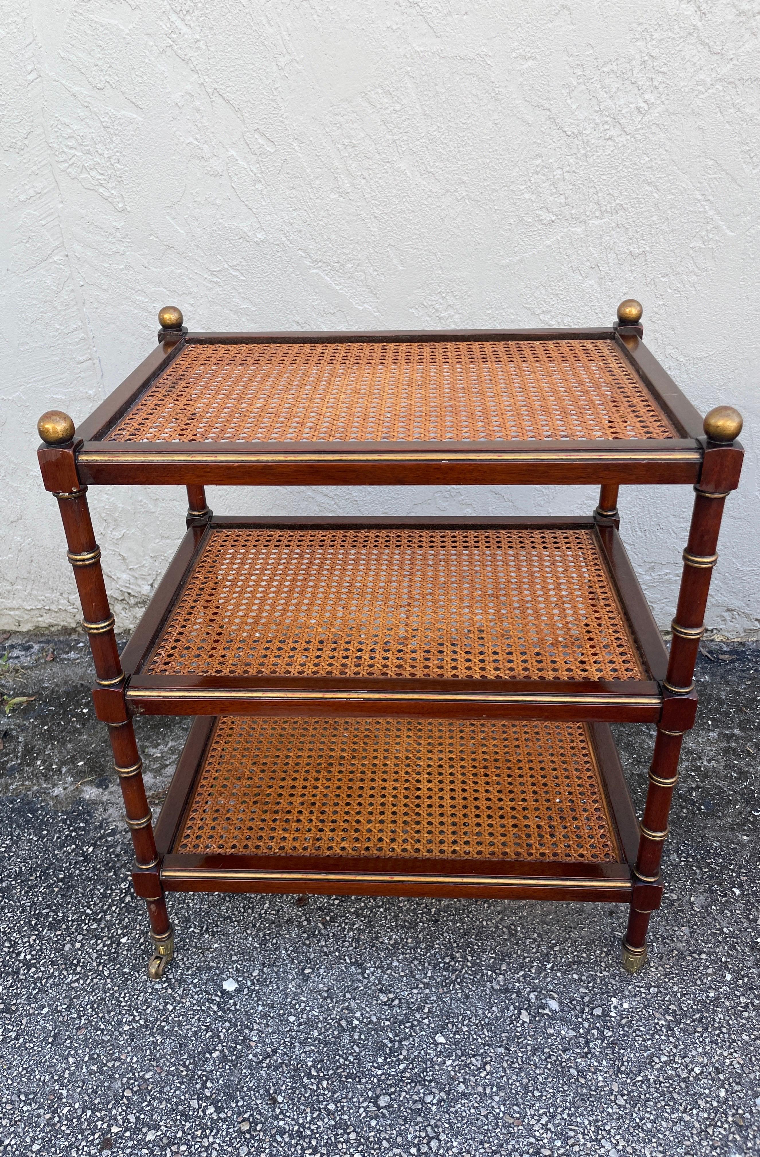 English Pair of Three Tier Caned Faux Bamboo Side Tables on Casters