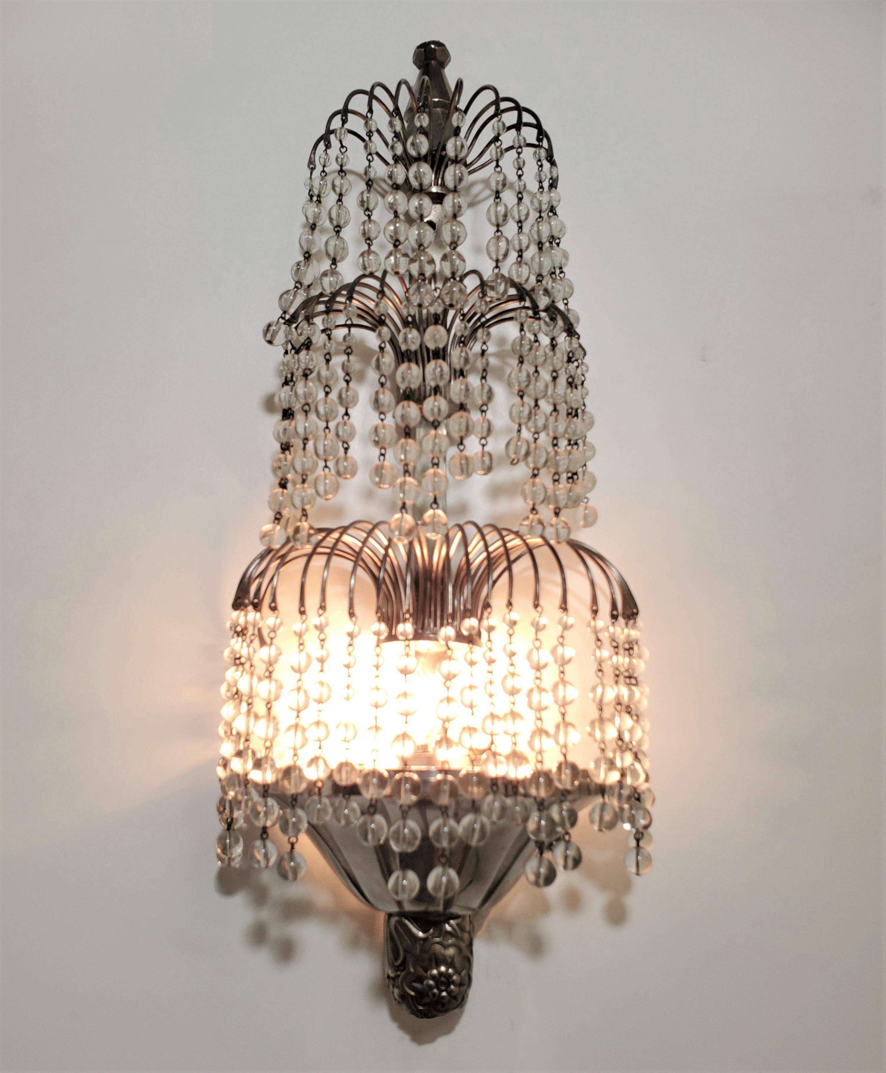 Pair of Tiered Crystal French Art Deco Wall Sconces Attrib to Sue et Mare In Good Condition For Sale In New York City, NY