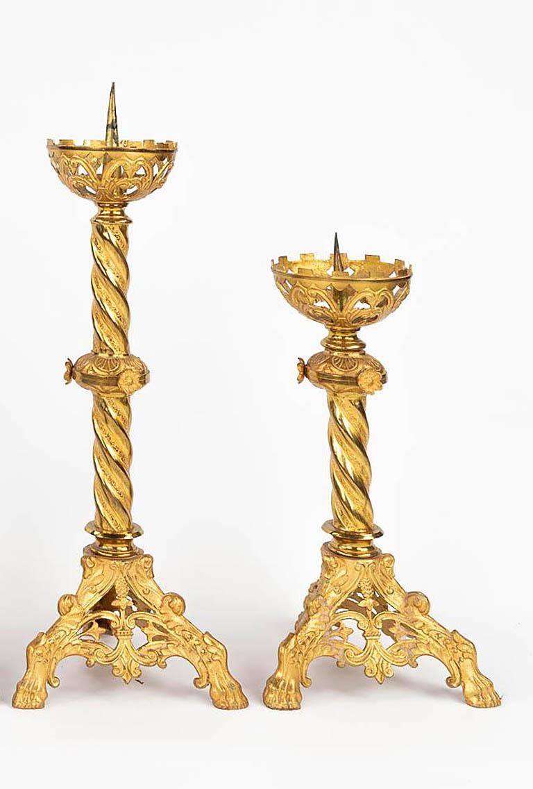 Pair of tiered gilt brass European Gothic Revival pricket candlesticks with Solomonic spiraling stems 

Anonymous
Europe; probably ca. 1900
Gilt Brass

Approximate size: 23 (h) x 6 (w) x 7 (d) in. (tallest of the pair)

This pair of tiered-scale