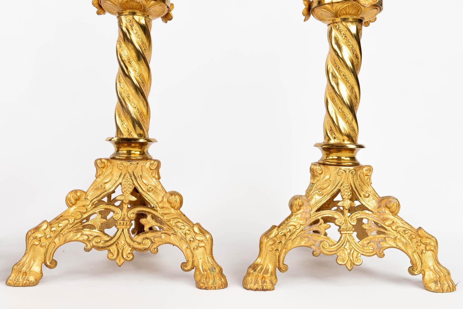 Cast Pair of tiered gilt brass European Gothic Revival pricket candlesticks with Solo For Sale