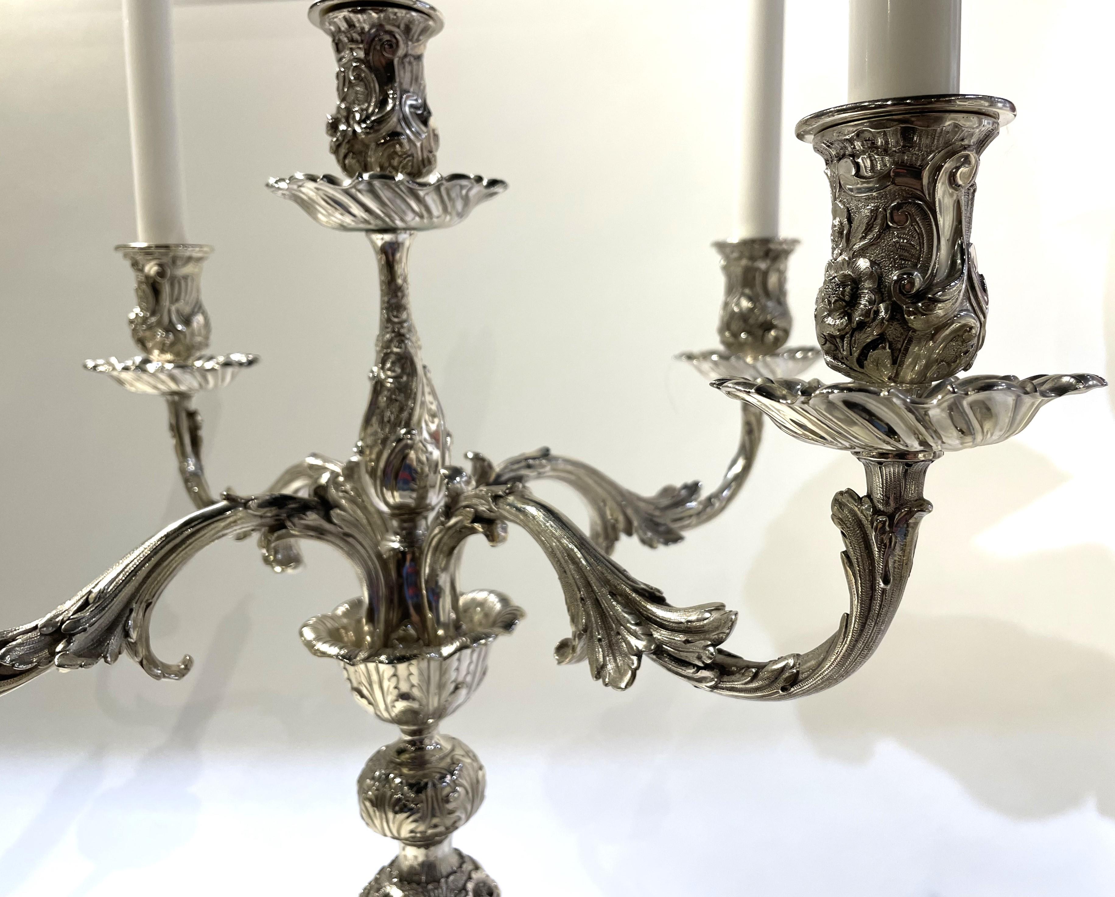 Early 20th Century Pair of Tiffany & Co. Sterling Silver 5-Light Monumental Repousse Candelabra For Sale