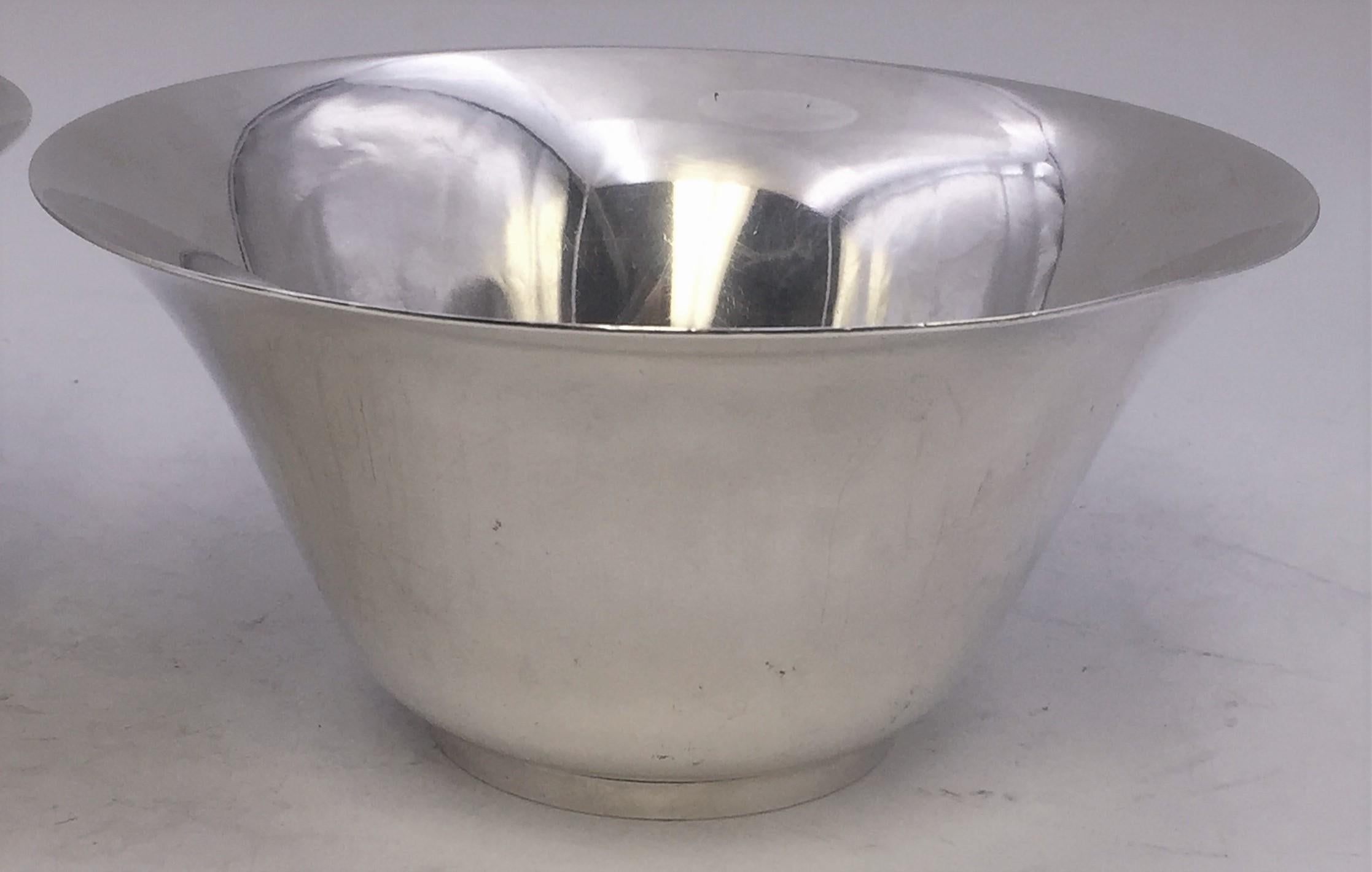 Pair of Tiffany & Co sterling silver modern bowls in bell form and in simple classic style with short base. Measuring 4 1/2 inches tall and 9 1/4 inches in diameter at top. Total weight is 62 troy ounces. Pattern 16667F from 1906. Bearing hallmarks