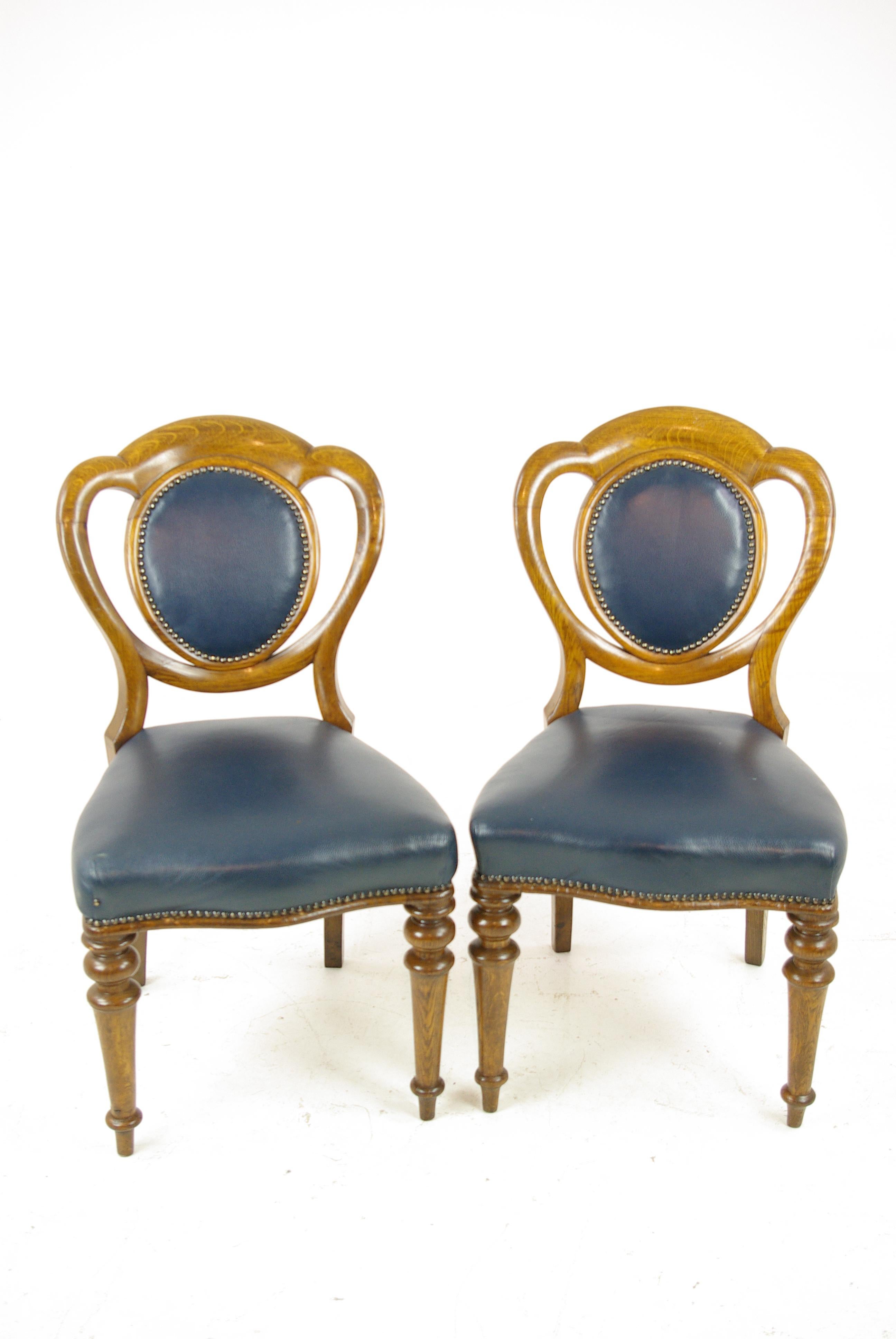 Pair tiger oak office chairs, desk chairs, office chairs, Scotland 1880, B1320

Scotland, 1920
Solid tiger oak construction
Original finish
Open back
Oval shaped back with blue leather insert
Upholstered seat with brass studs
Ending on