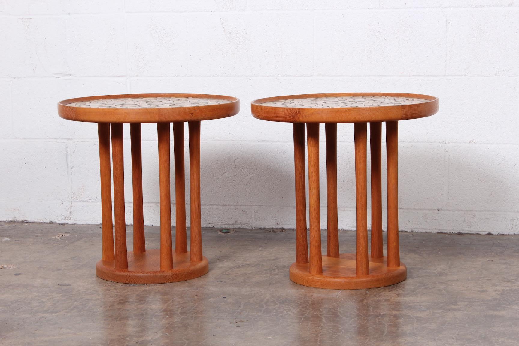 A pair of teak tables with ceramic tiles by Gordon Martz for Marshall Studios.