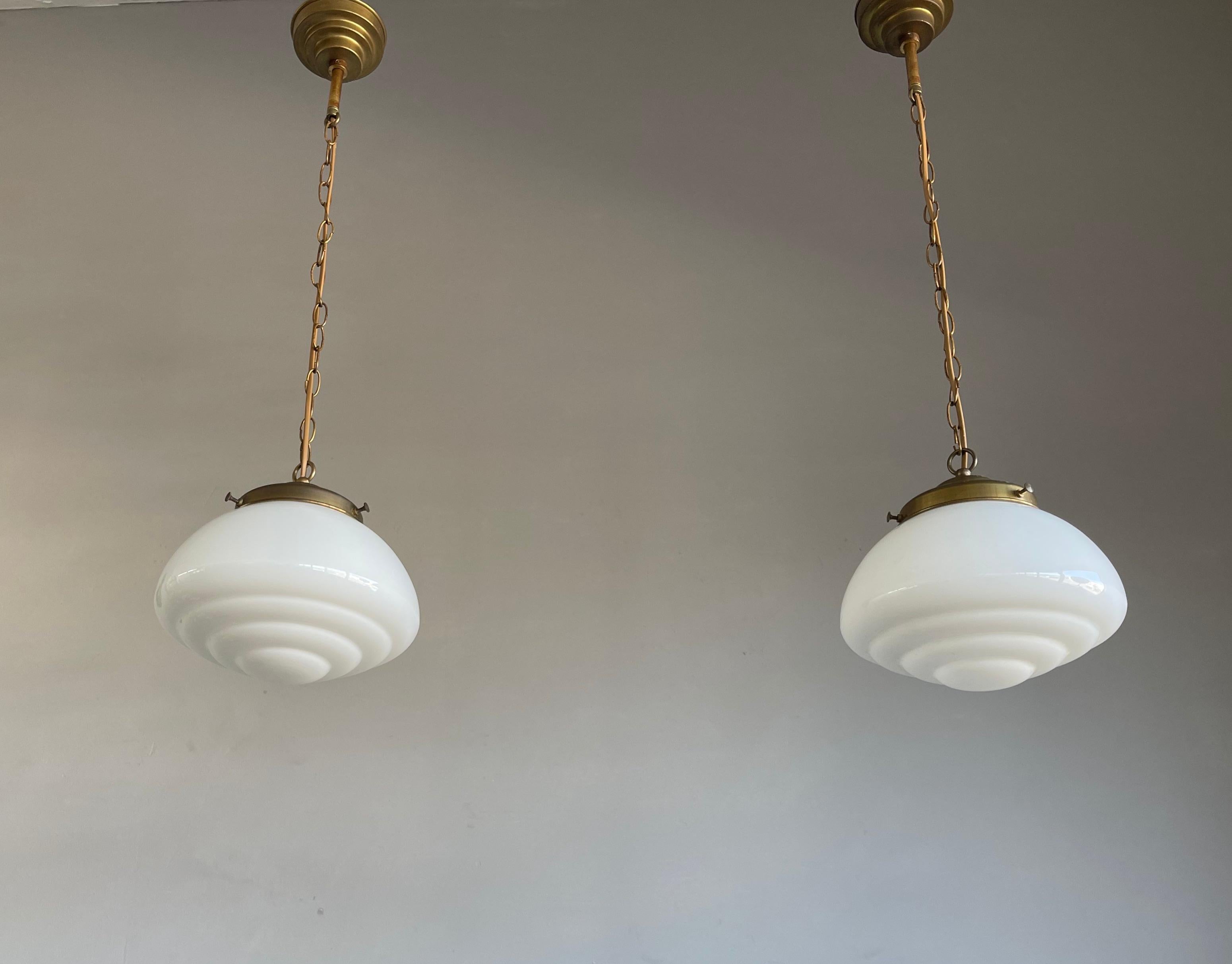 Beautiful shape and excellent condition pendants.

Finding one rare original light fixture is a good thing, but finding two is always that extra bit special. So if you are looking for a beautiful pair of pendants to grace your entry hall, kitchen or
