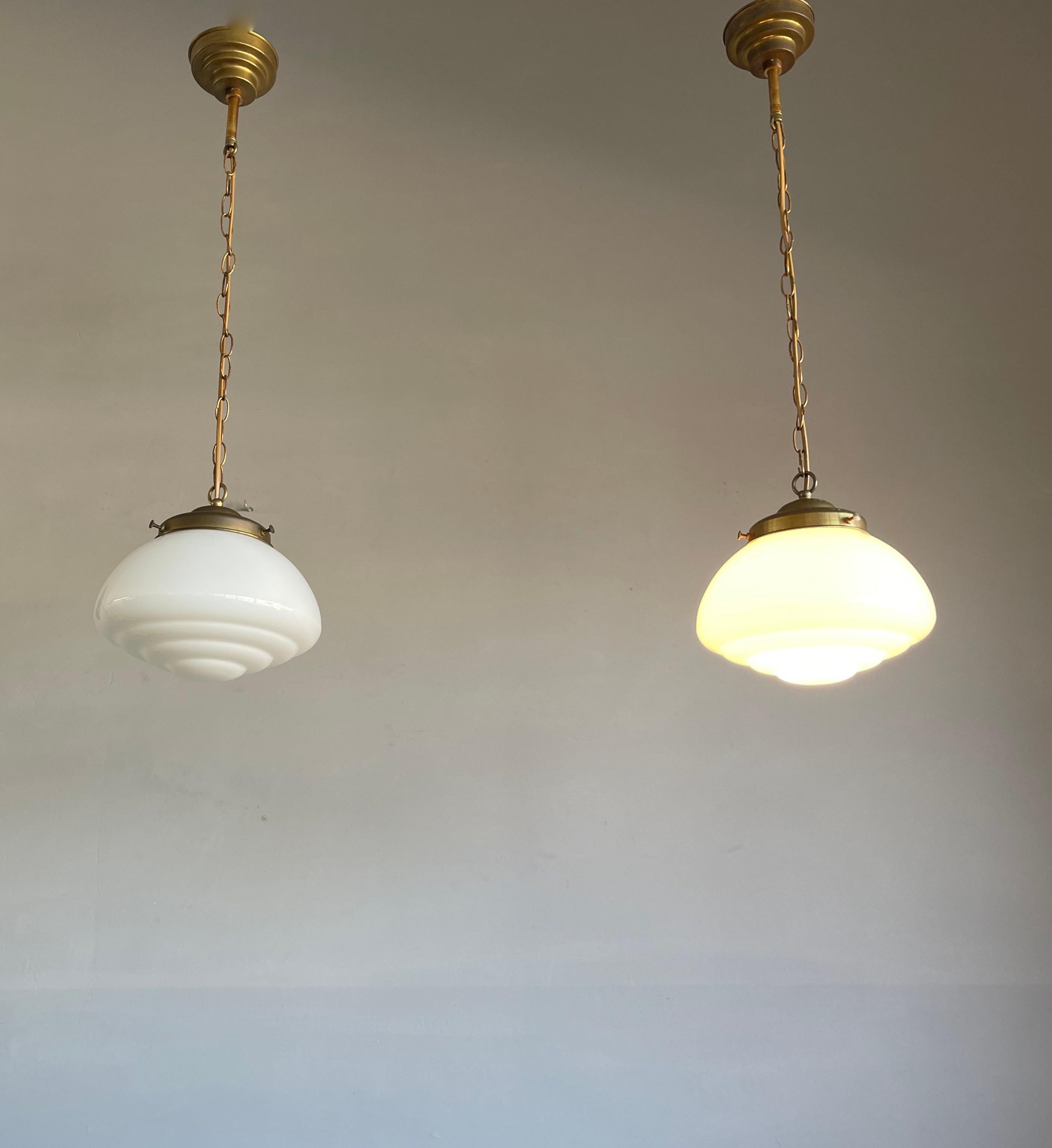Pair of Timeless Art Deco and Bauhaus Style Brass and Opaline Pendant Lights In Good Condition In Lisse, NL