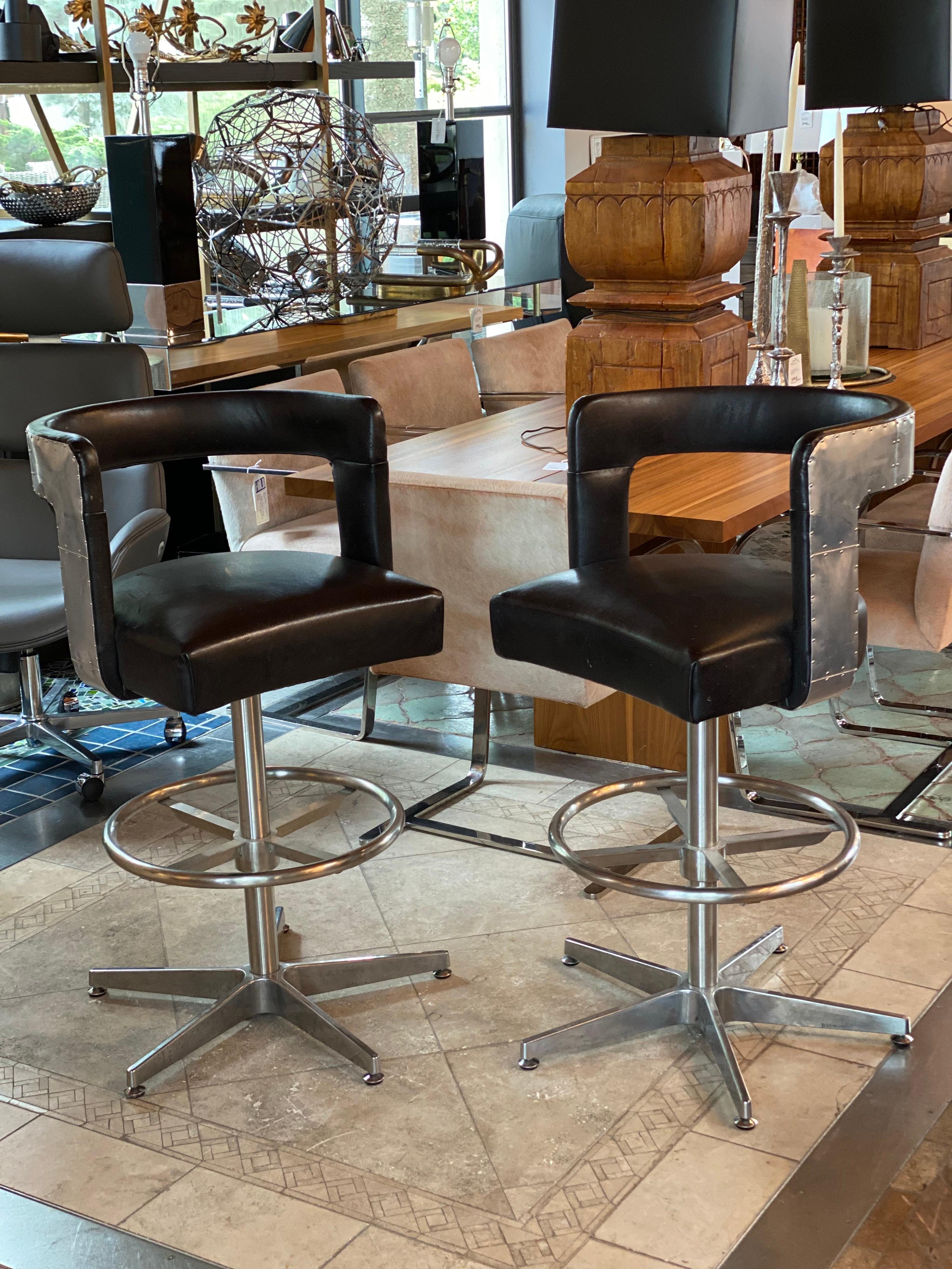 Pair of Timothy Oulton circus leather barstools

Measures: 21.5