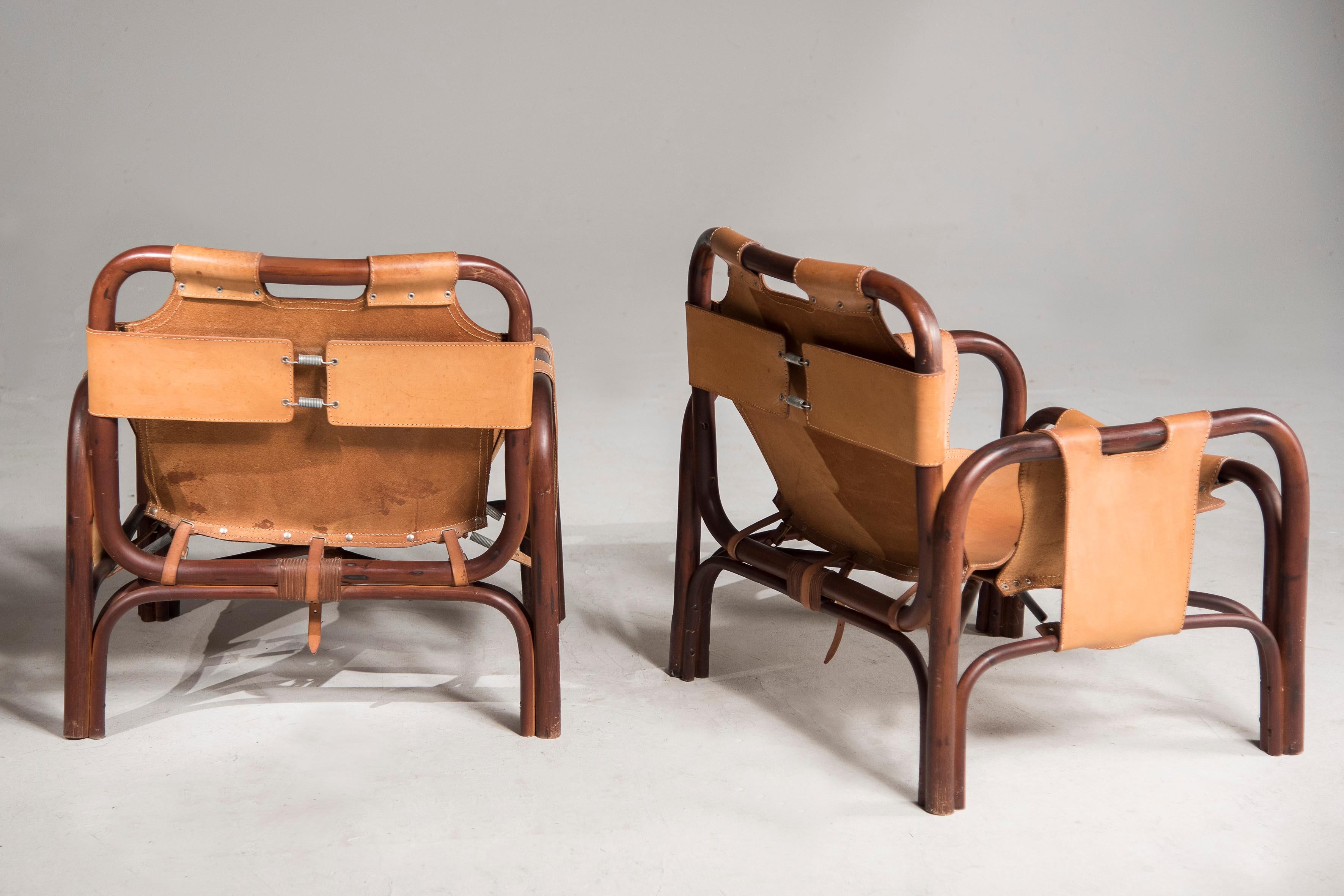 Pair of Safari model armchairs by Tito Agnoli from the 1970s
Leather
Conservatively restored - there are stains on the leather
Price Euro 4800 pair
Measures 67x63 x71 cm.
 