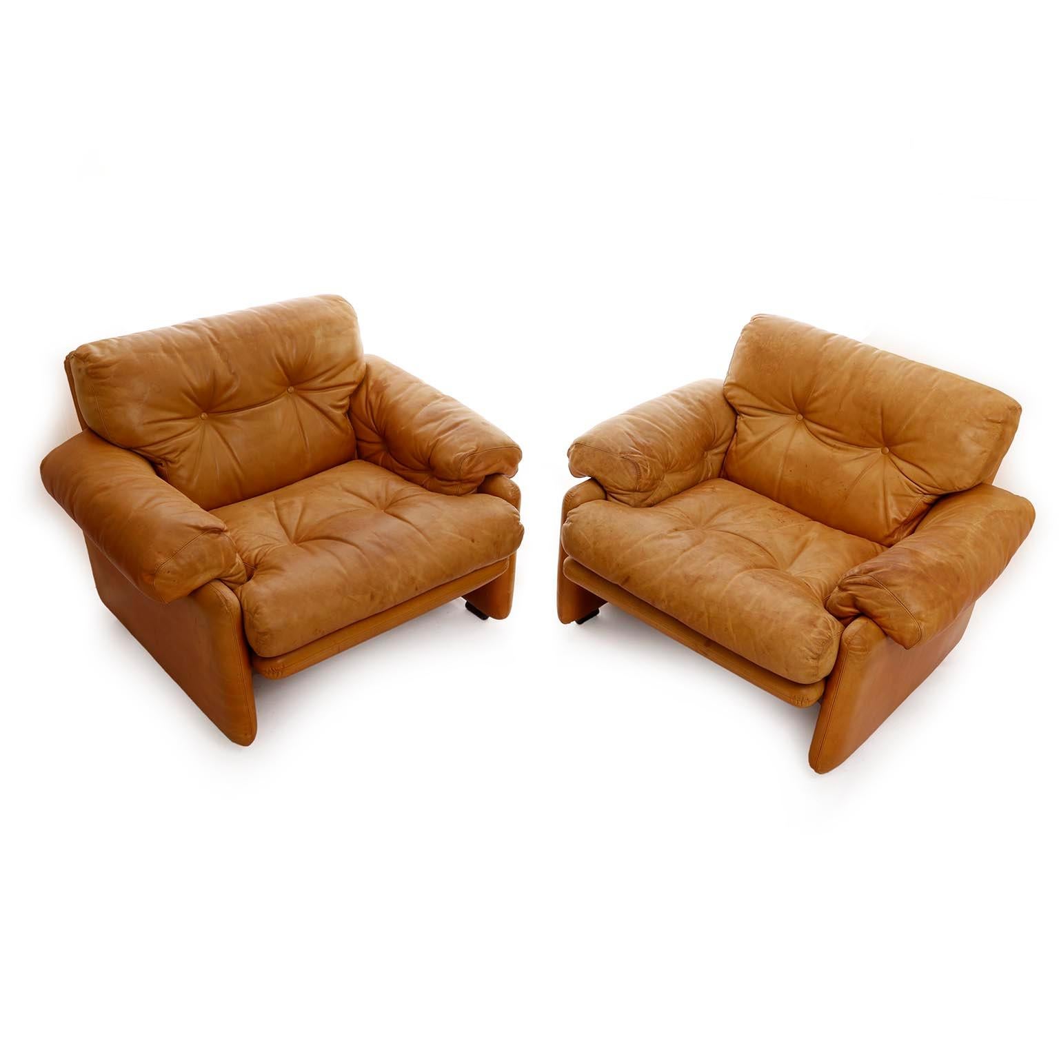 A pair of club armchairs designed by Tobia Scarpa for C&B Italia, manufactured in Italy in midcentury in 1970s.
They are made of warm toned patinated cognac leather with loose cushions for seats and backs.