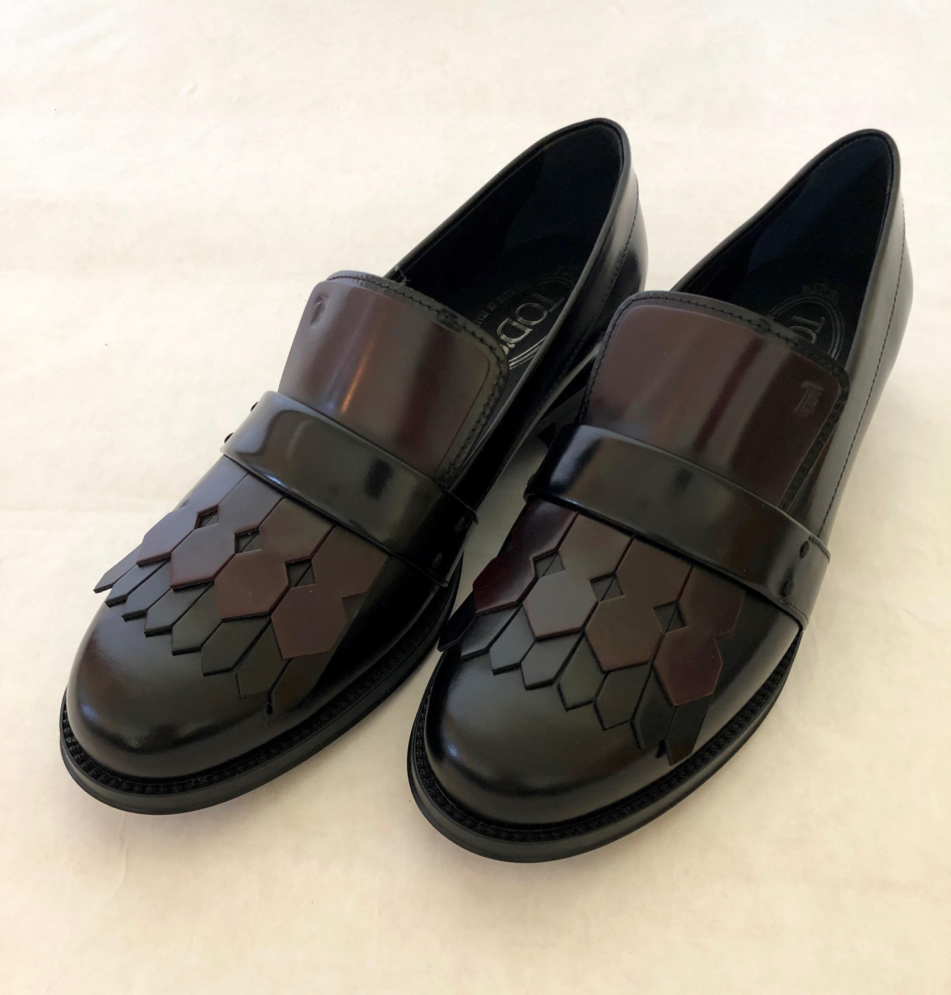 Pair of Tod's Cordovan (Burgundy) & Black Leather Kiltie Tassel Flap Loafers For Sale 2