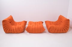Pair of Togo Armchairs and footstool by Michel Ducaroy for Ligne Roset