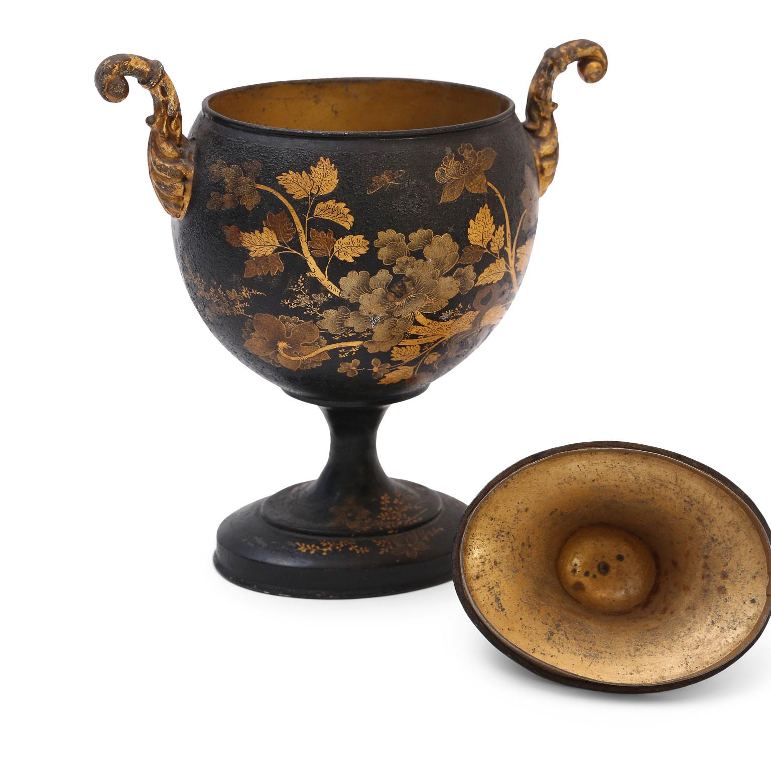 Pair of tole chestnut urns, circa 1830-1860, England. Original hand painted gilt decoration.