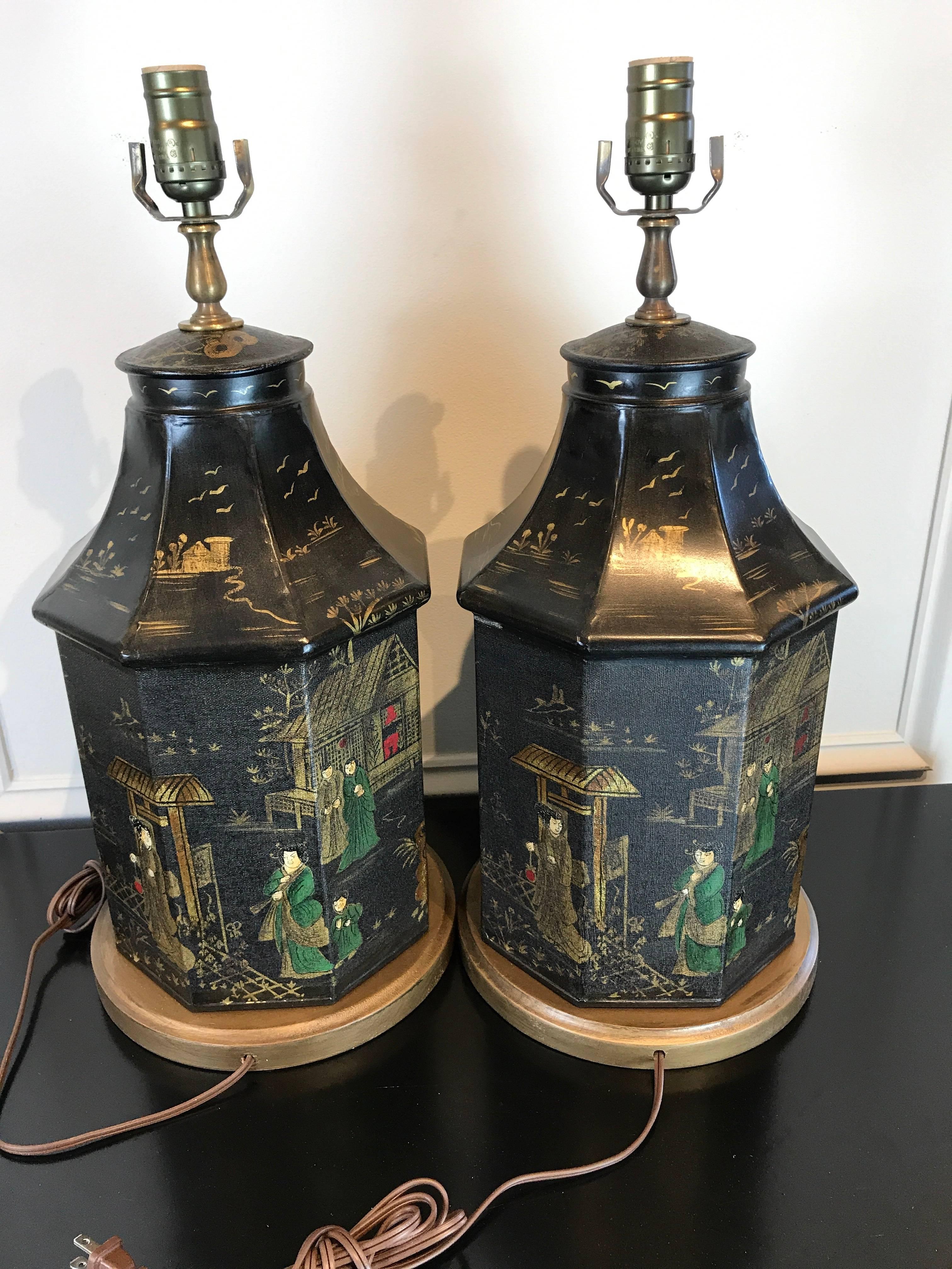 Pair of tole chinoiserie tea canisters, now as lamps standing 22