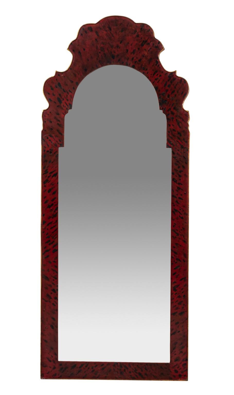 Pair of Tole faux painted mirrors with curved crown. Please note of wear consistent with age including silver loss to the mirror plate and paint loss.
