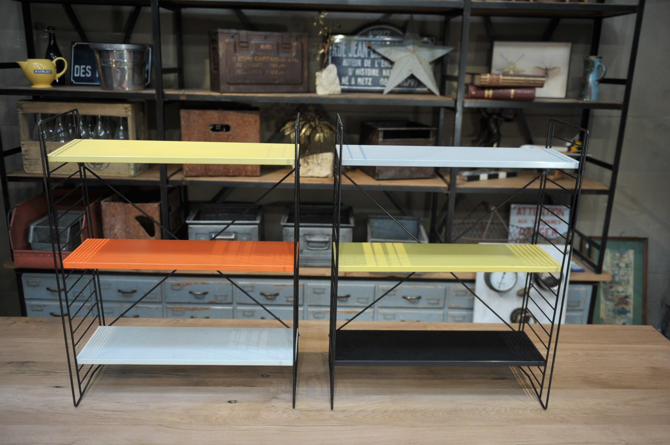  midcentury multi-color metal shelves with three removable and adjustable shelves in original color yellow black white and red, circa 1960. Can be taken apart for safe shipping anywhere in the world.Price for one pieces 2 to 4 available .
  