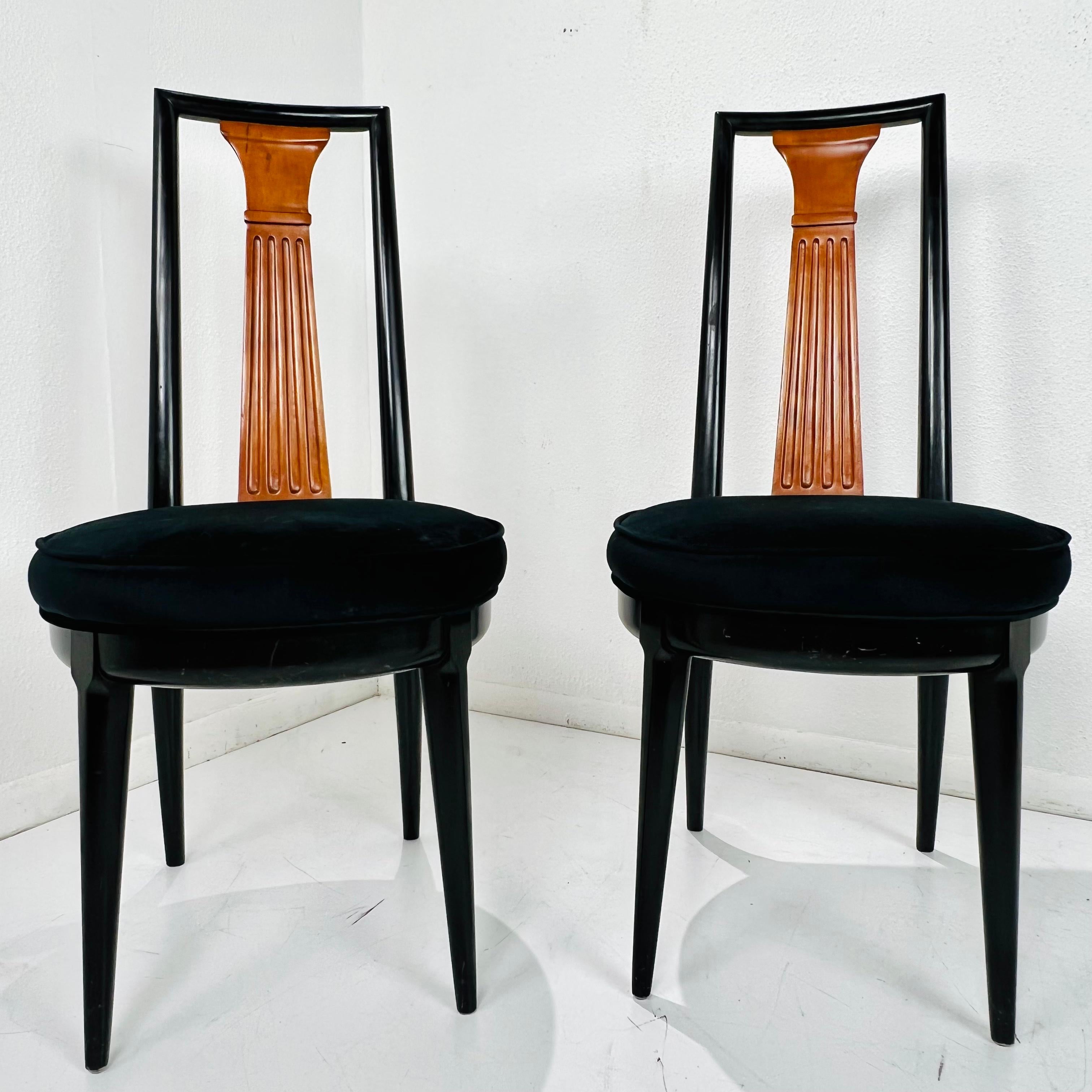 These beautiful and rare Tomlinson Furniture highback model #63 side chairs from their “Sophisticate Collection” are a distinctive, graceful interpretation of their time. Made from solid Pecan wood, these chairs have a sleek, tall back rest and