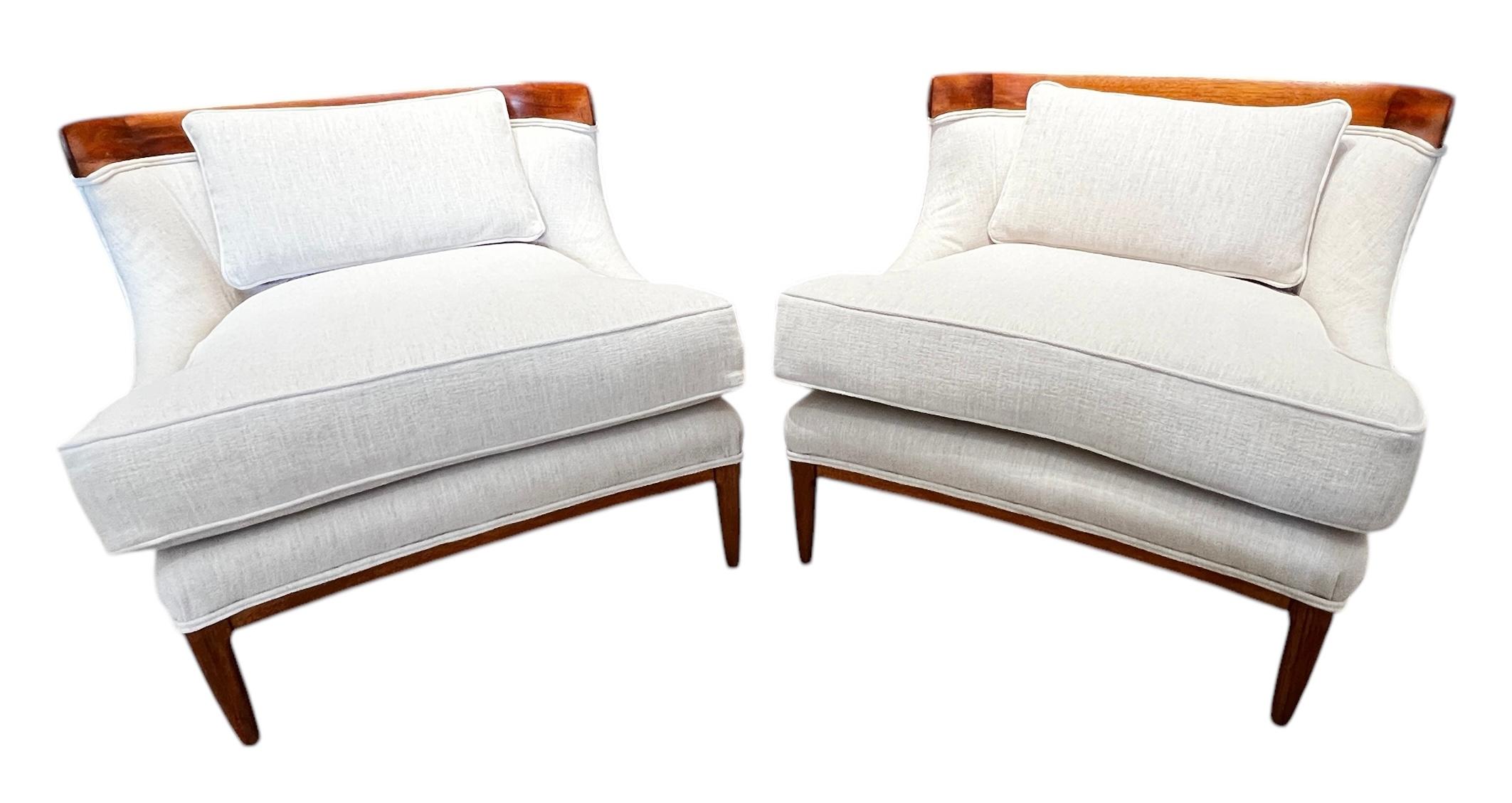 Pair of Mid-Century Tomlinson Sophisticate Slipper Chairs in Walnut and Ivory Upholstery. Excellent vintage condition with age appropriate wear.  Chairs have been refinished and reupholstered. 