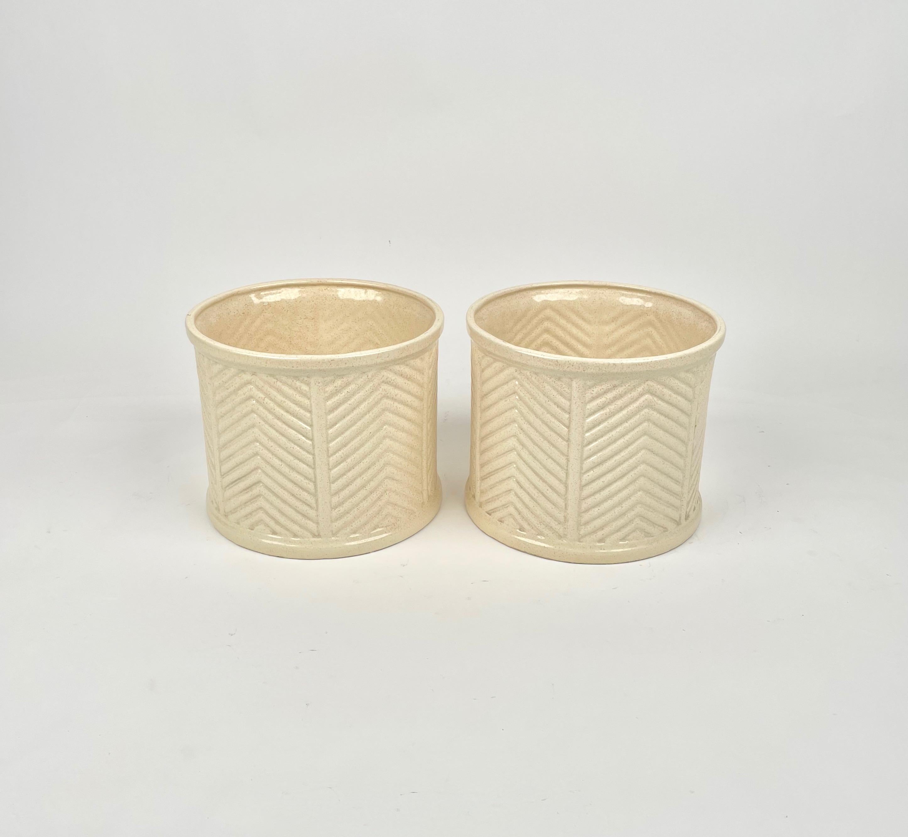 Pair of beige ceramic vases by B Ceramiche for Tommaso Barbi. Made in Italy in the 1970s. 

They both have the original stamp 
