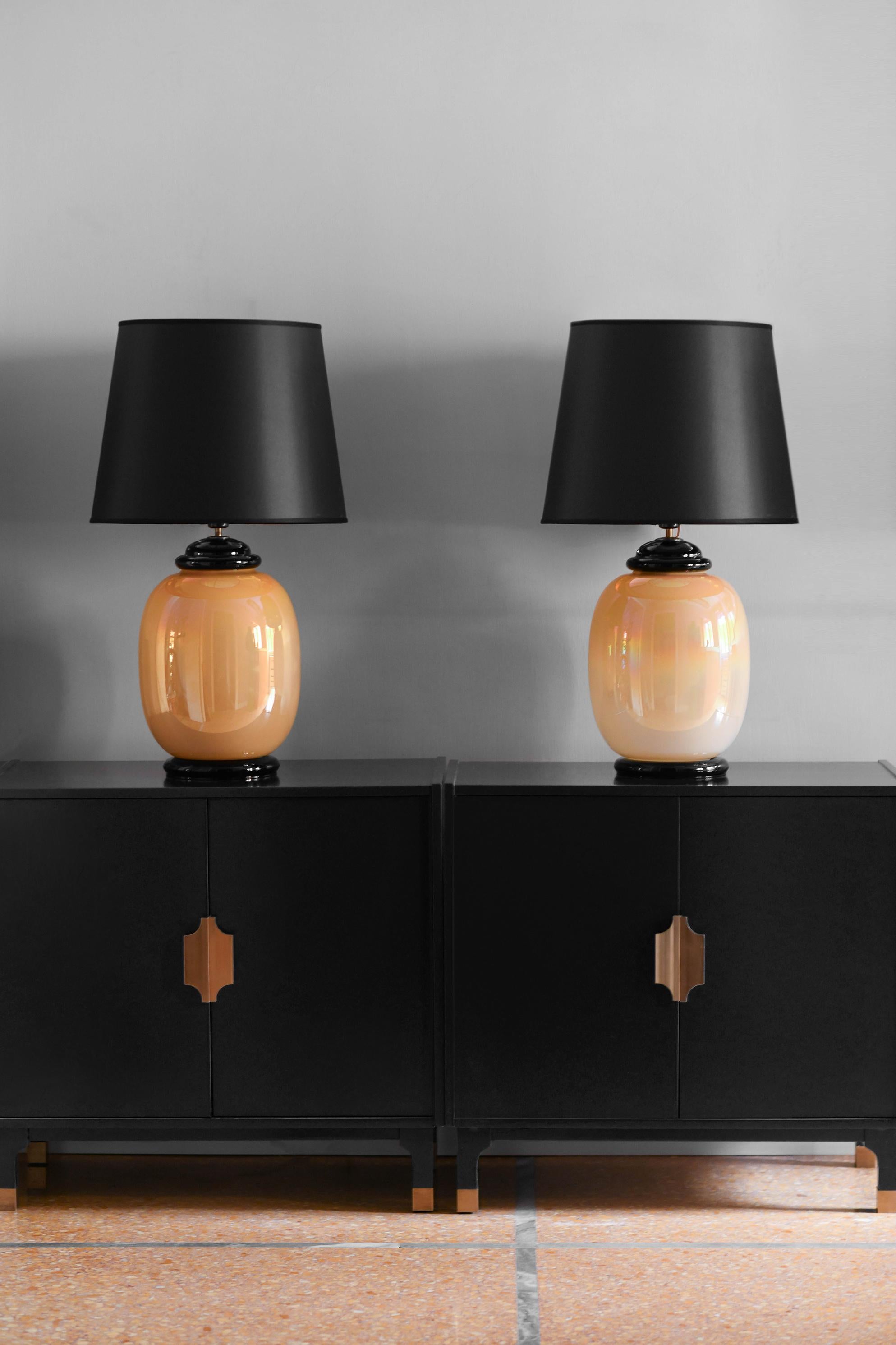 Pair of Tommaso Barbi lamps in opaline Murano glass complete with black chinè fabric lampshade, Italy 1980.
Dimensions of the single lamp: 45 w x 76 h x 45 d cm
Sold as set of 2.