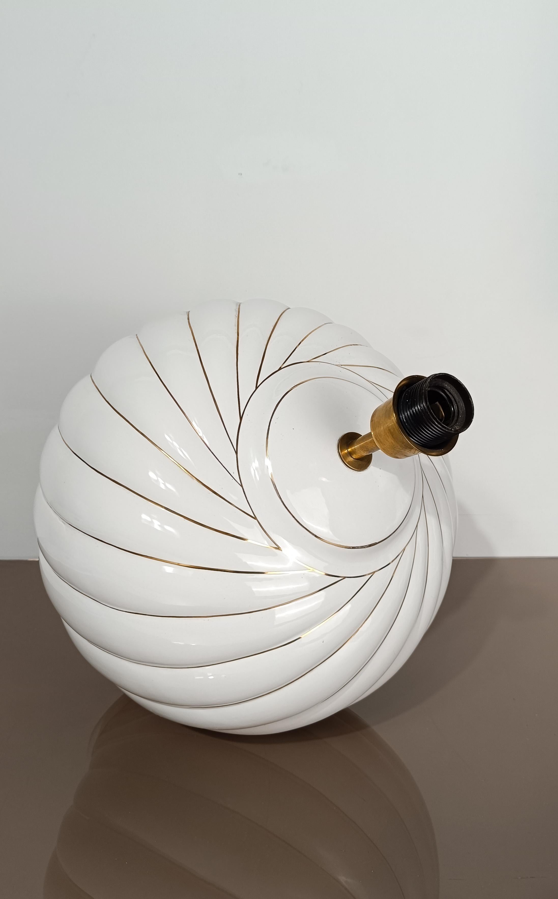Pair of Tommaso Barbi's Table Lamps in white and gold glazed ribbed ceramic, 70s en vente 10