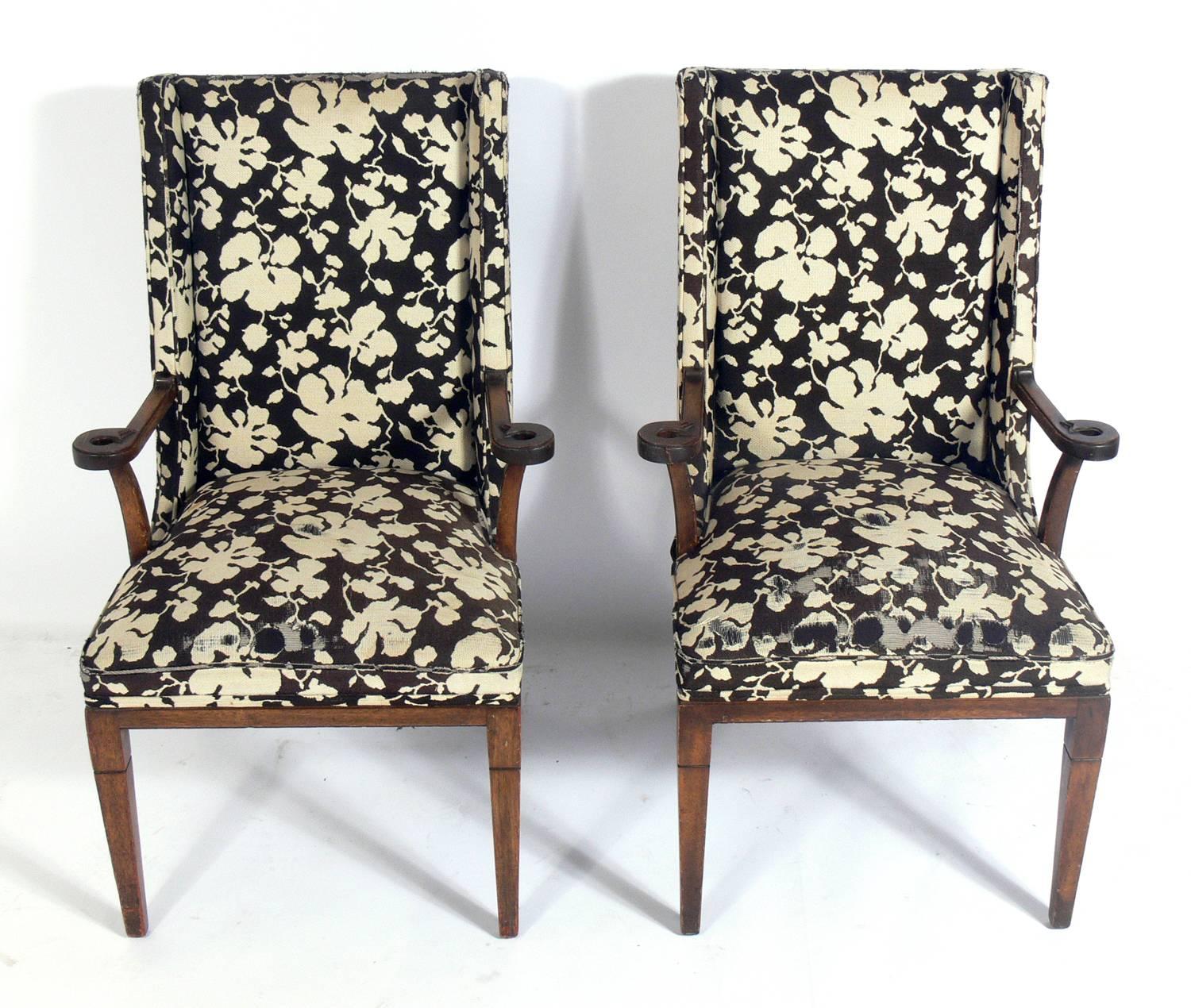 Pair of Elegant armchairs, designed by Tommi Parzinger for Charak, American, circa 1950s. These chairs are currently being refinished and reupholstered. The price noted below includes refinishing in your choice of color and reupholstery in your