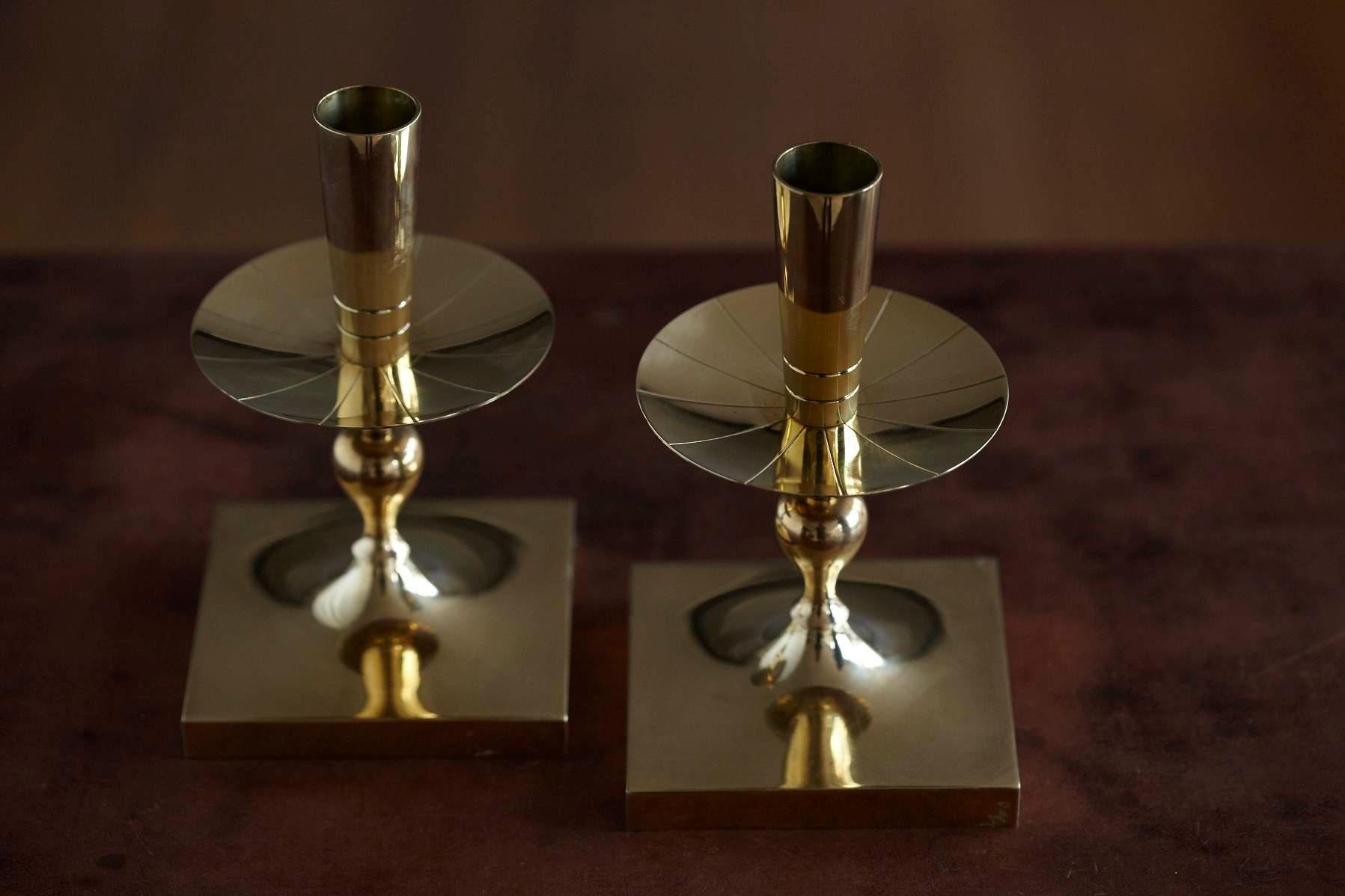 Polished Pair of Tommi Parzinger Brass Candleholders Made By Dorlyn Silversmiths For Sale