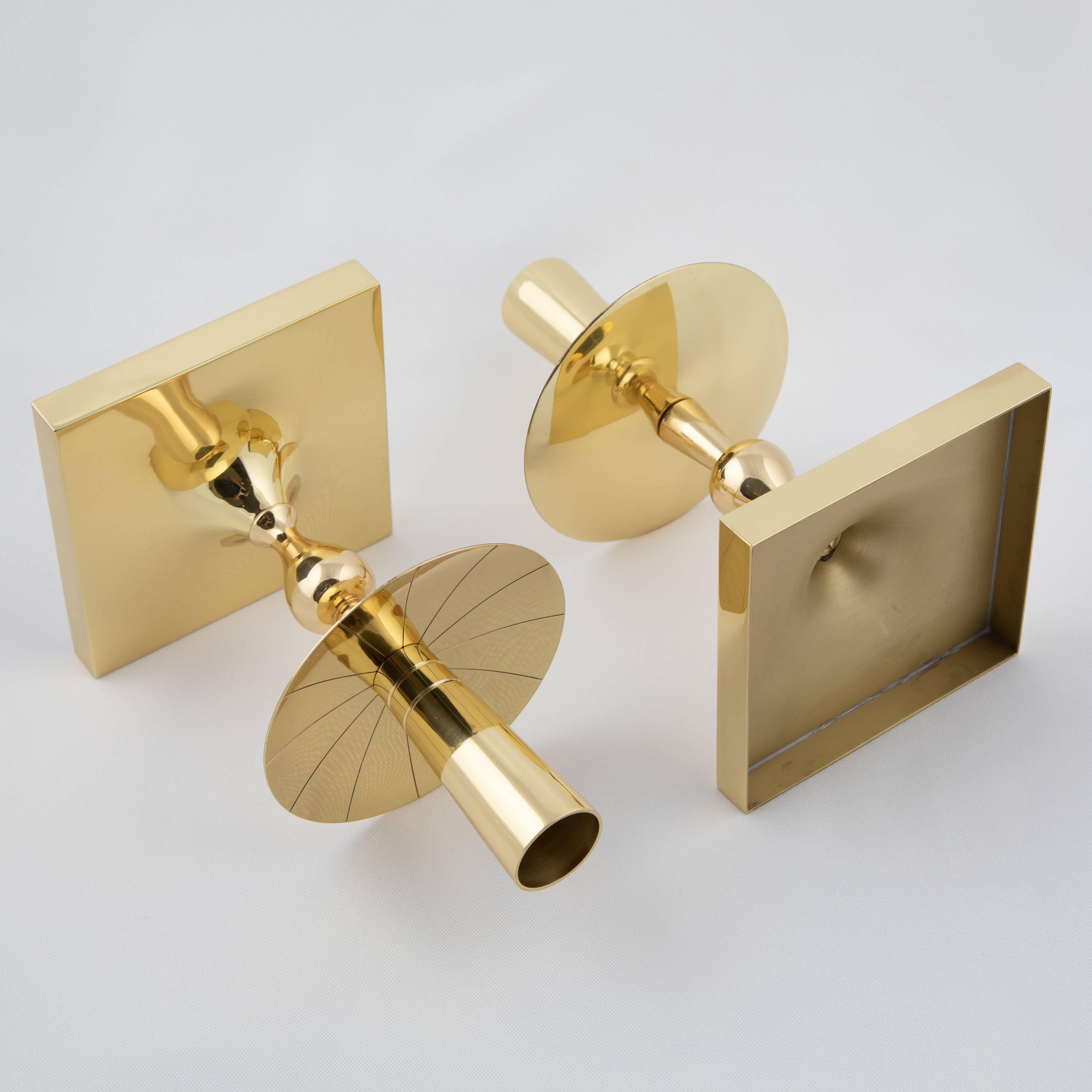 Polished Pair of Tommi Parzinger Brass Candleholders with Square Bases, circa 1950s For Sale