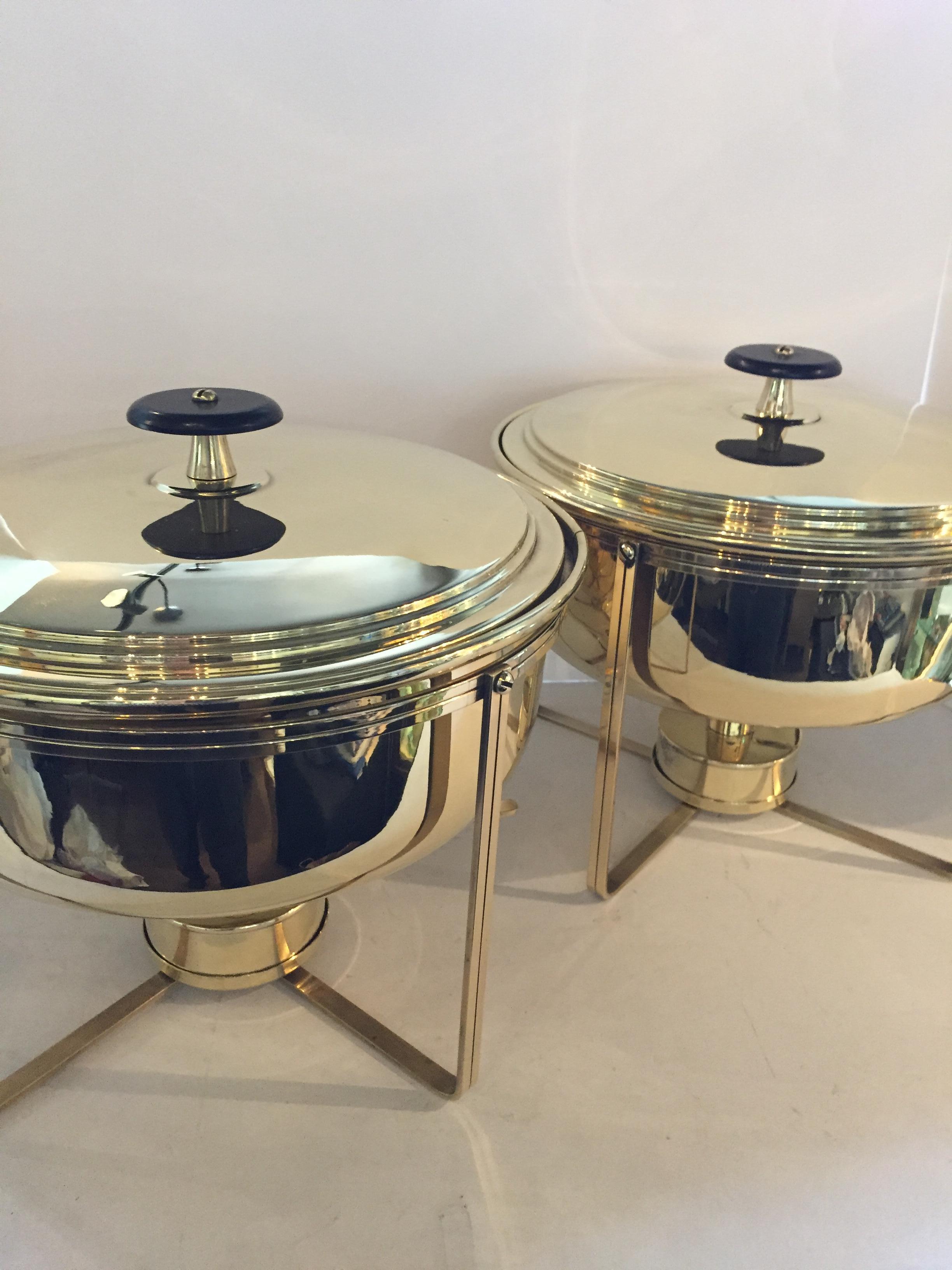 Pair of Tommi Parzinger for Dorlyn Silversmiths brass lacquered heated base chafing dishes.