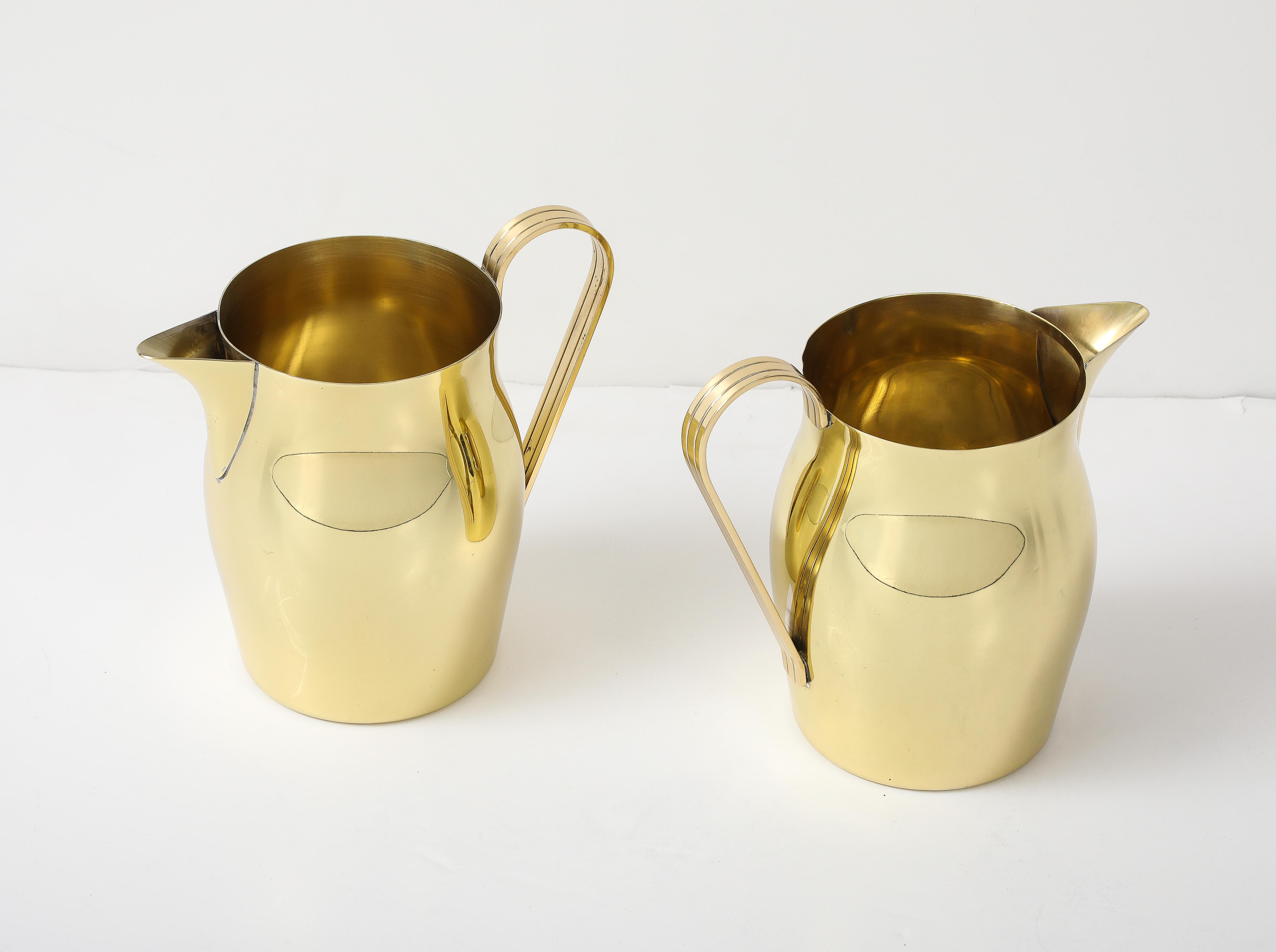 Pair of Tommi Parzinger Brass Pitchers In Excellent Condition For Sale In New York, NY