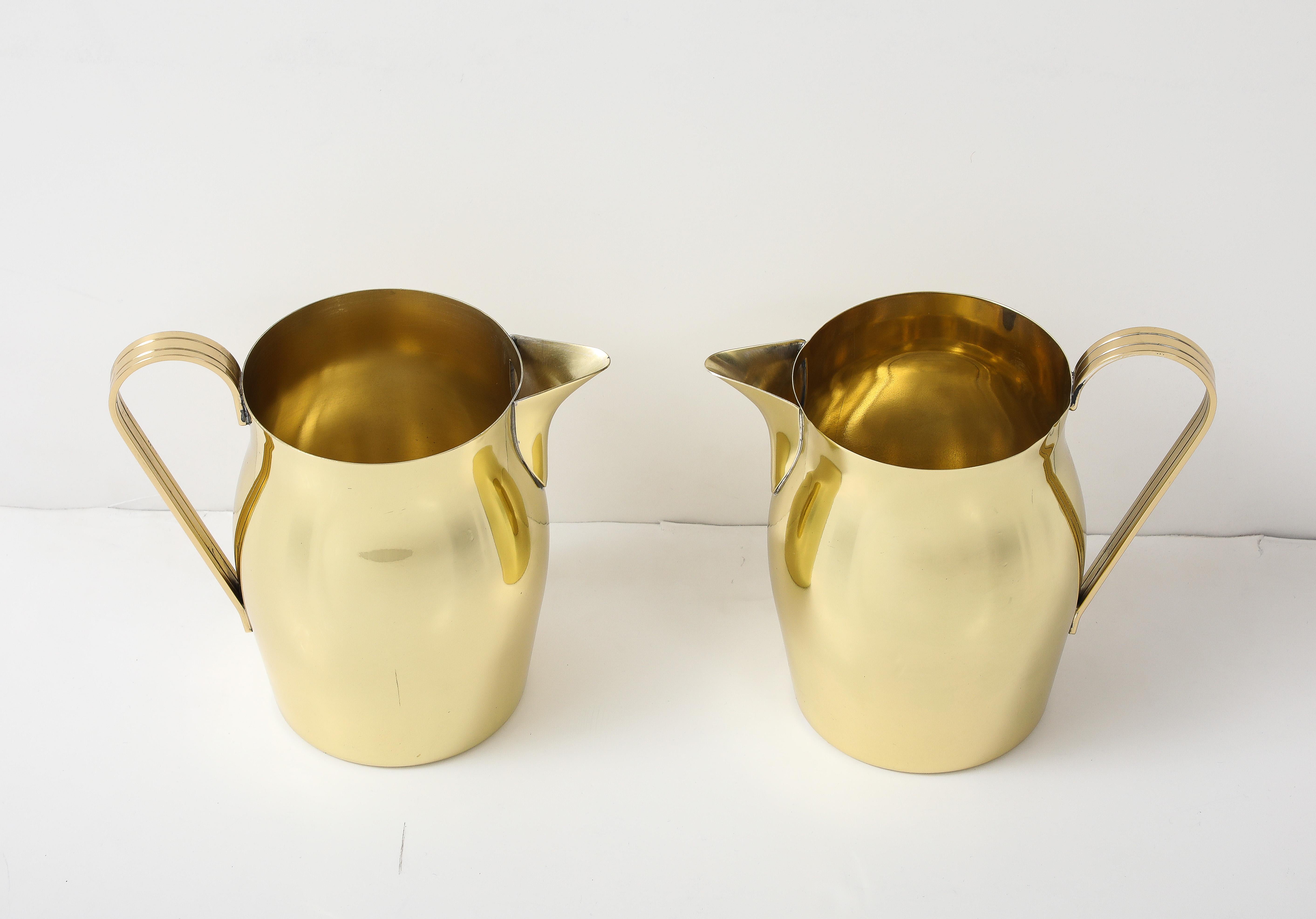 20th Century Pair of Tommi Parzinger Brass Pitchers For Sale