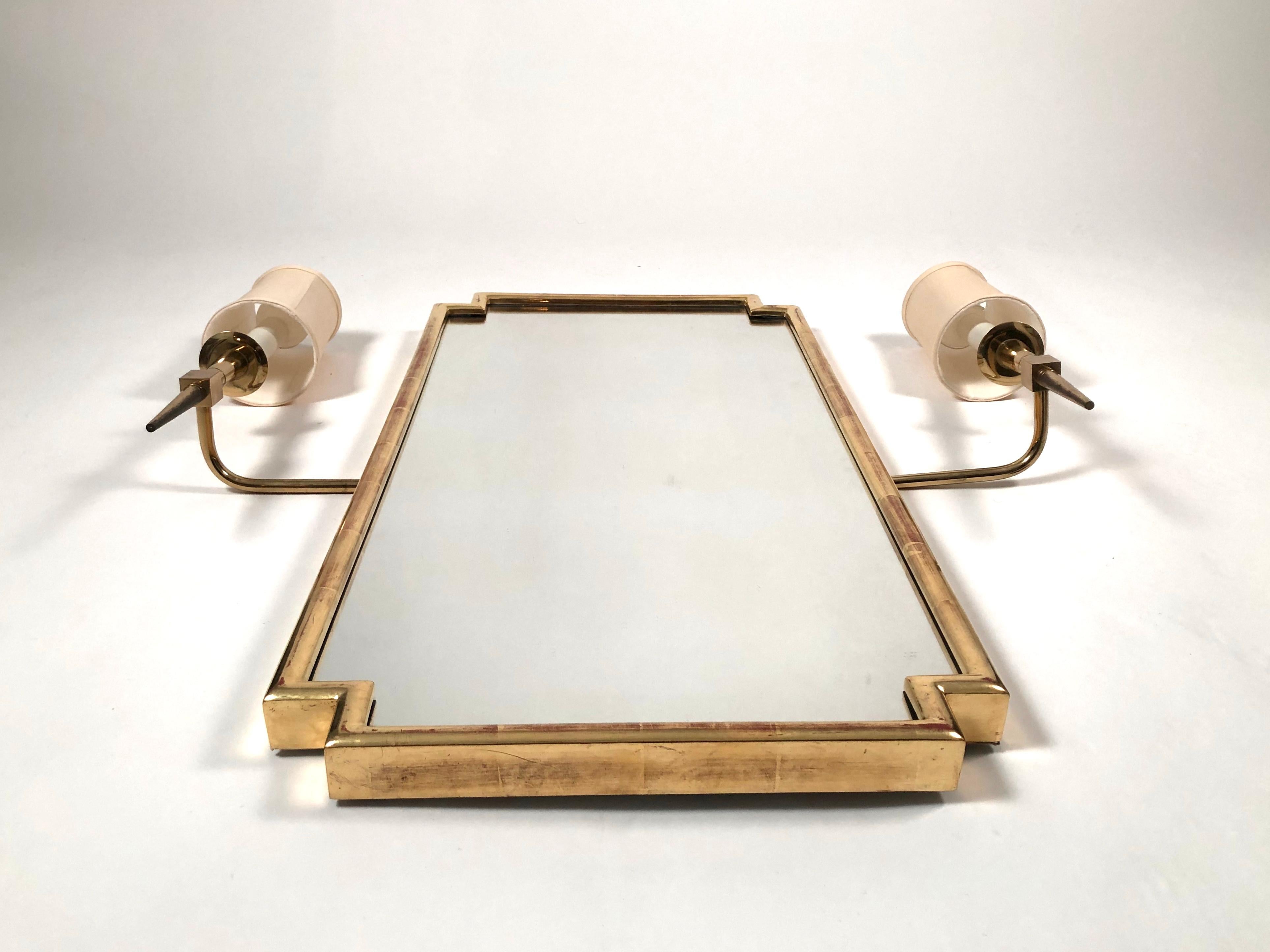 Mid-Century Modern Pair of Tommi Parzinger Brass Sconces Together with Giltwood Mirror