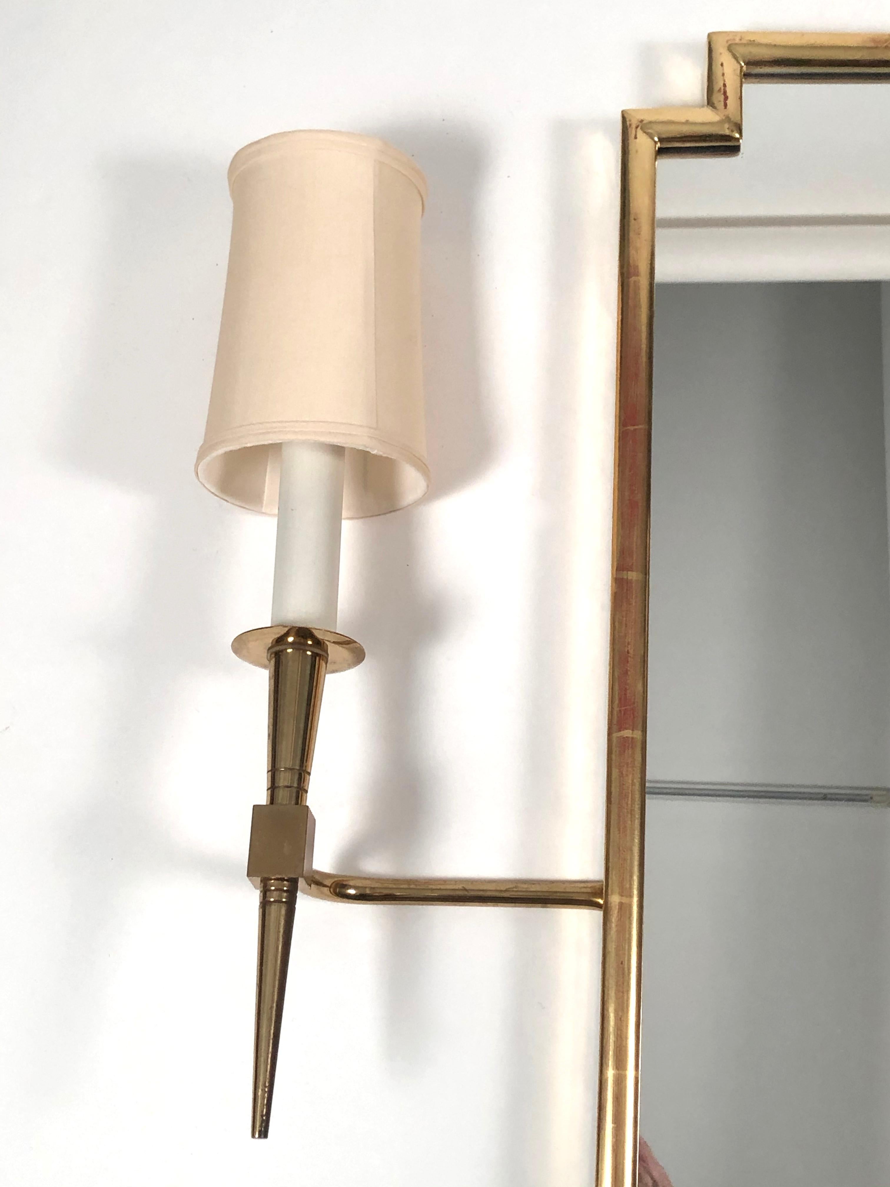 Pair of Tommi Parzinger Brass Sconces Together with Giltwood Mirror (amerikanisch)