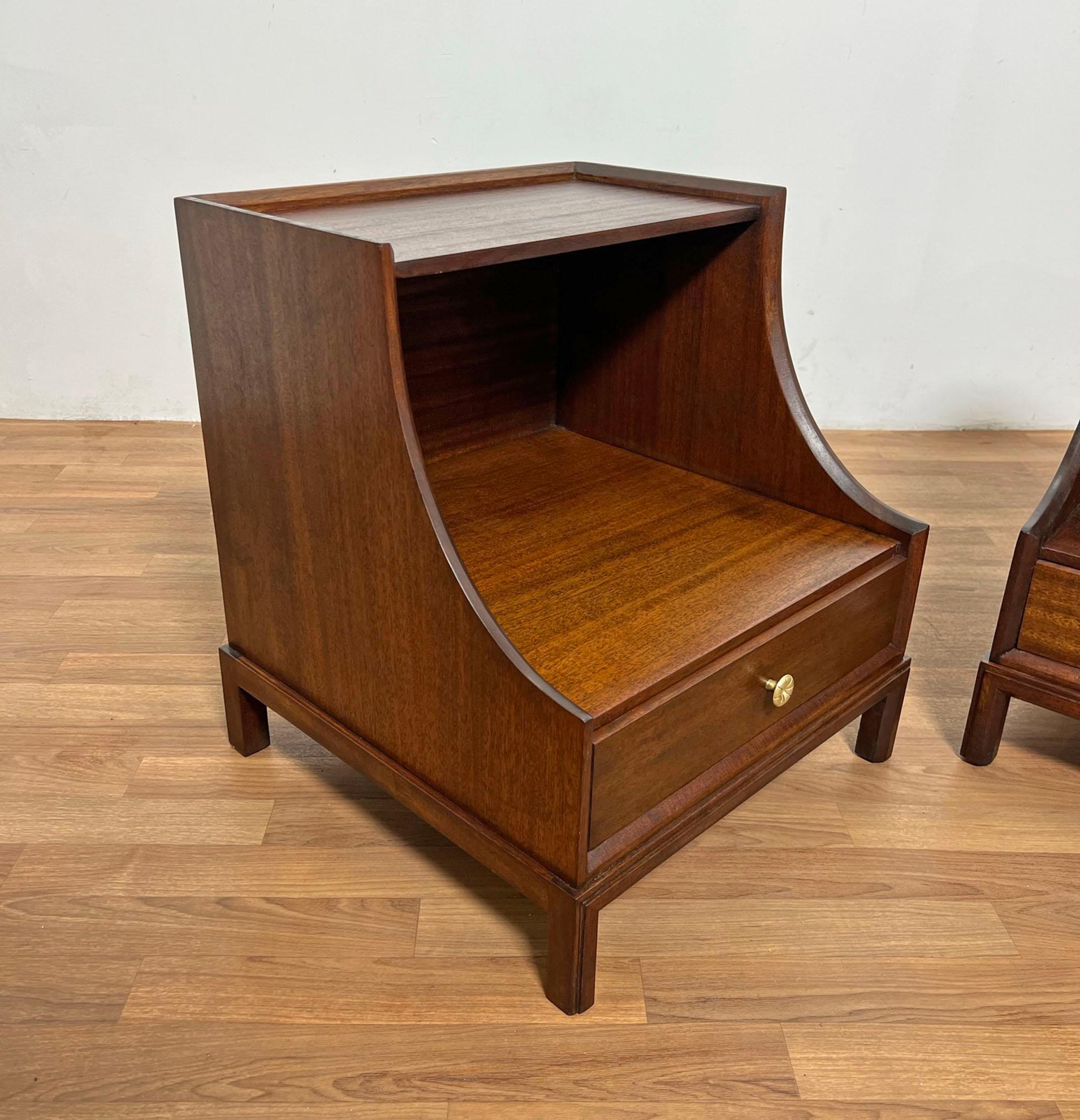 Pair of scoop front nightstands by Tommi Parzinger for Charak Modern, circa 1950s.