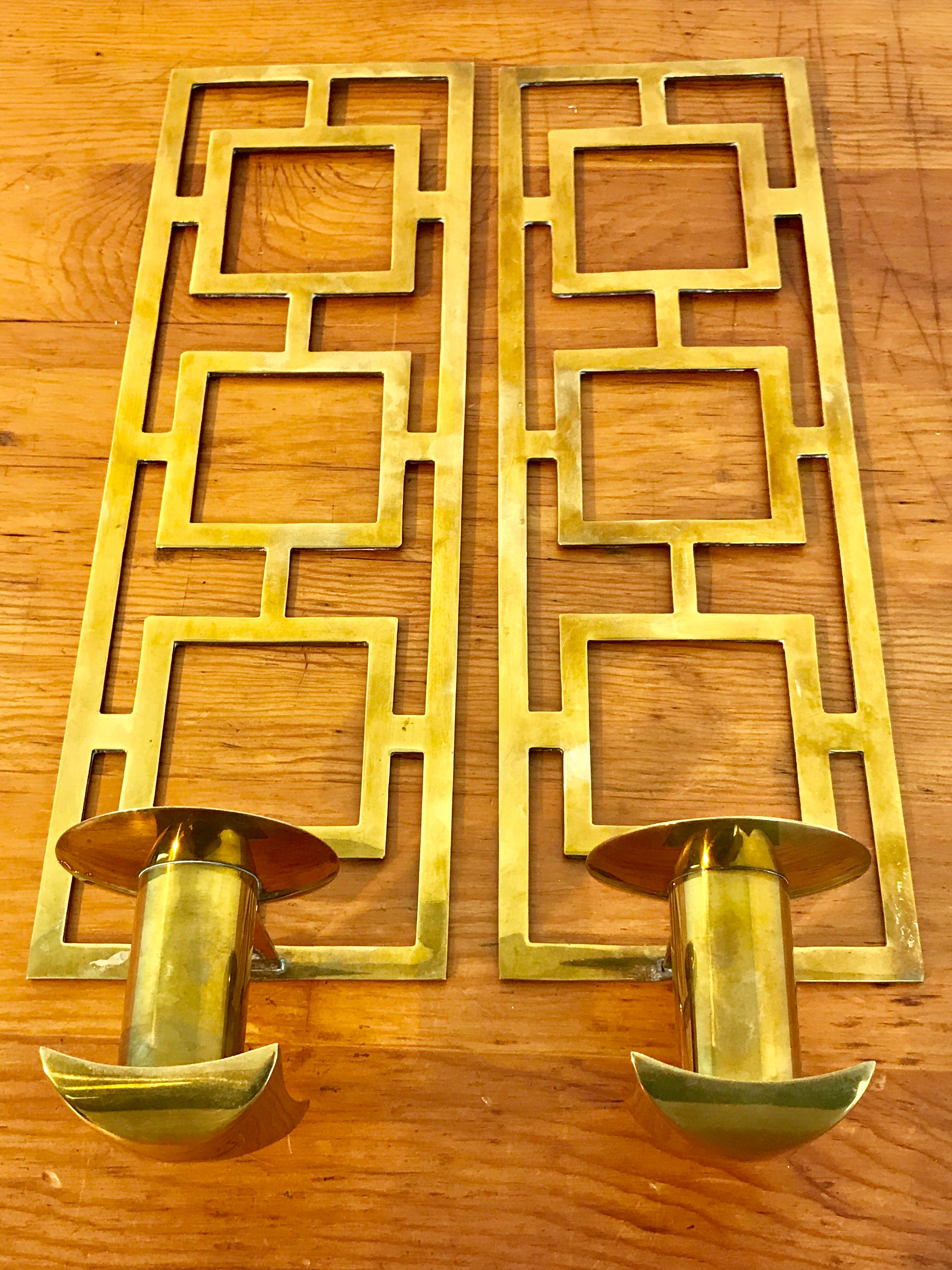 Pair of Tommi Pazzinger style brass candle sconces (#5188) by Sarried, Each one fitted with one 3