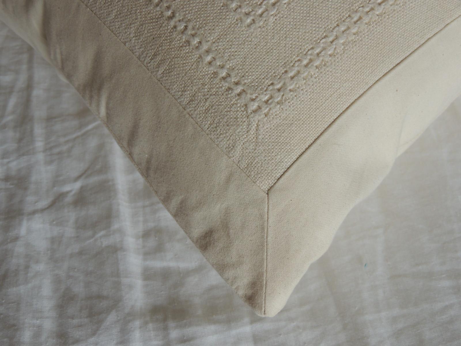 Pair of Tone-on-Tone Beige Eyelet Linen Decorative Bolster Pillows 1