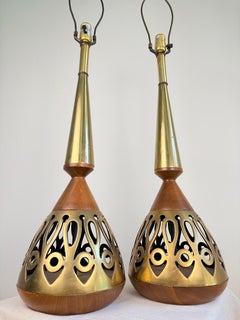 Pair of Tony Paul for Westwood lamps, walnut with brass cut out pattern