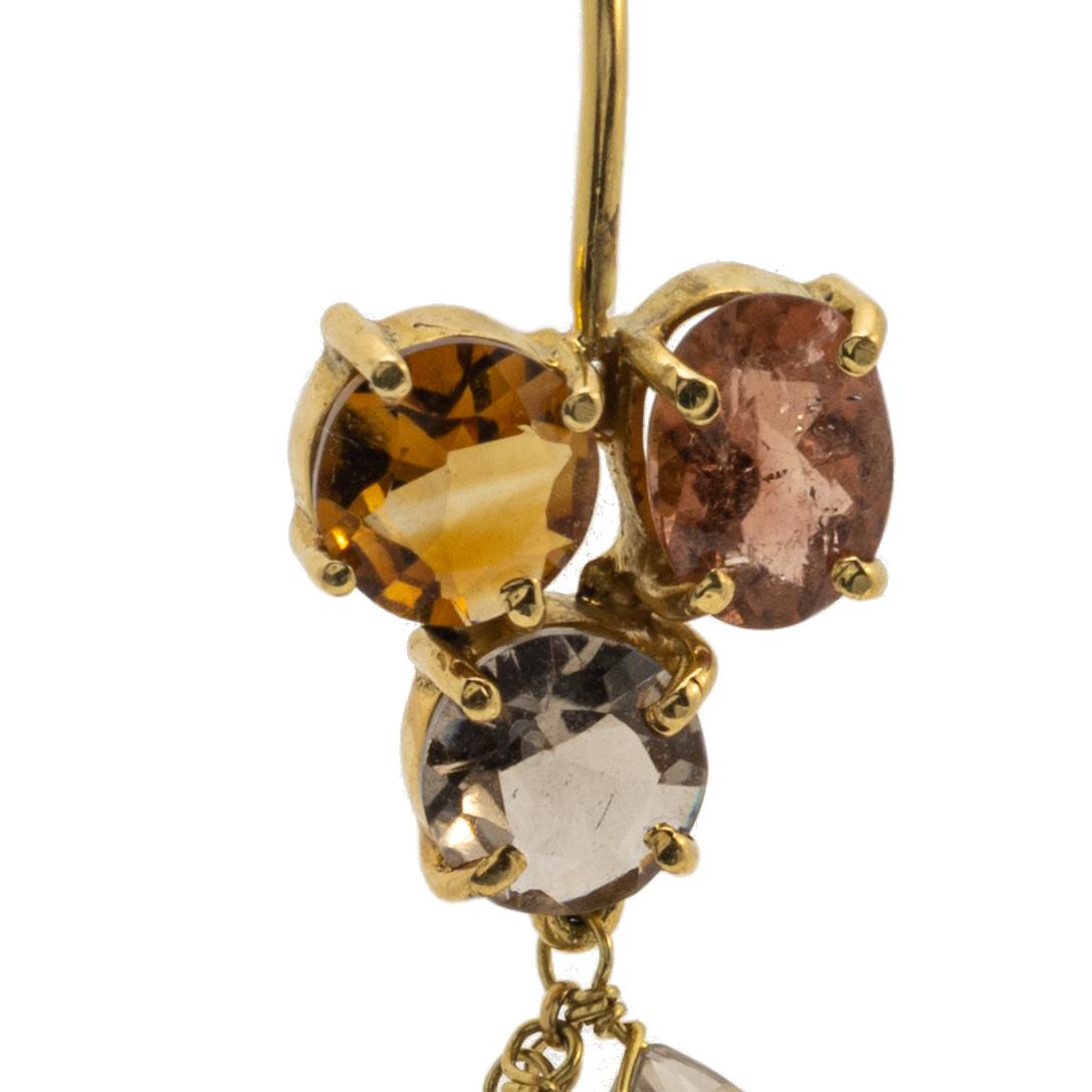 Pair of topaz earrings, of chandelier design, each set with circular-cut and tear drop topaz, suspending topaz drops, mounted in yellow gold, 1.78 inches